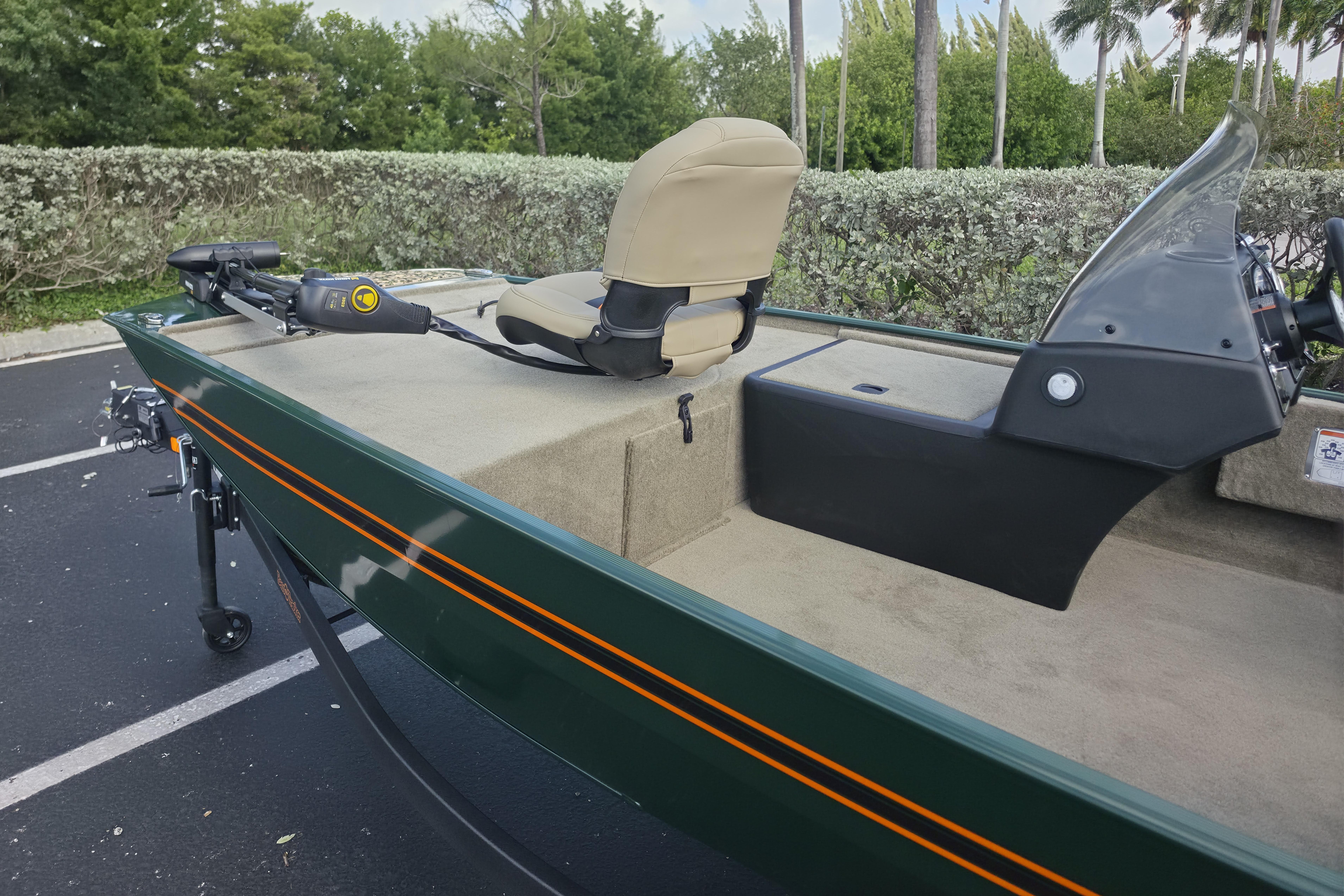 2026 Tracker Bass Tracker Classic Limited boat with beige seating and control panel.