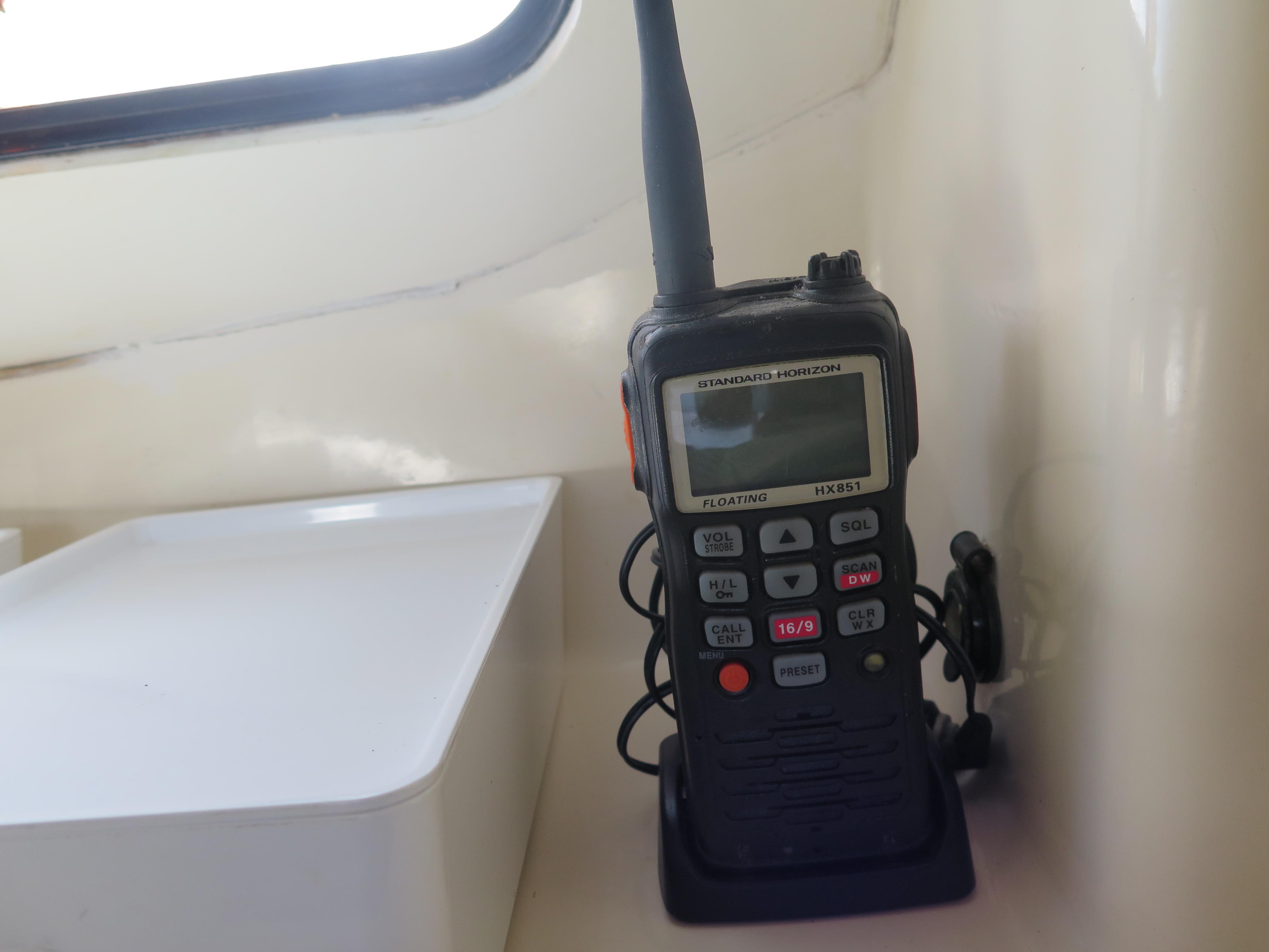 Handheld radio on Fountaine Pajot Tobago 35 catamaran, 1999 model, interior view.