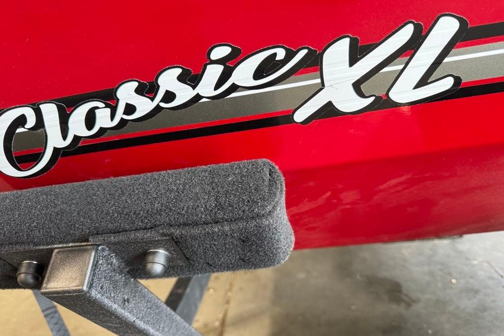 2026 Tracker Bass Tracker Classic XL boat with red exterior and "Classic XL" decal.