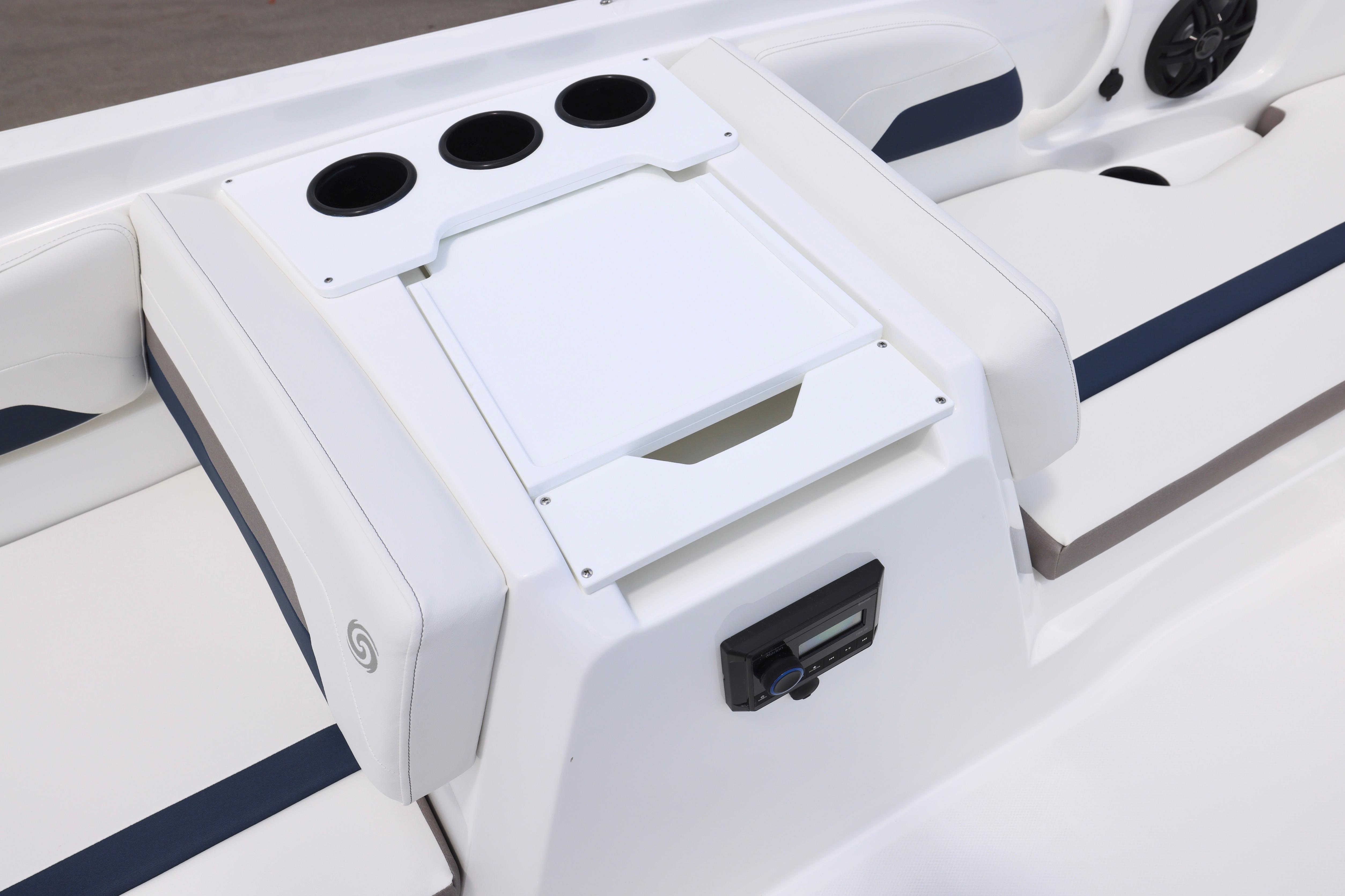 2026 Hurricane SunDeck Sport 205 OB boat interior with cup holders and seating area.