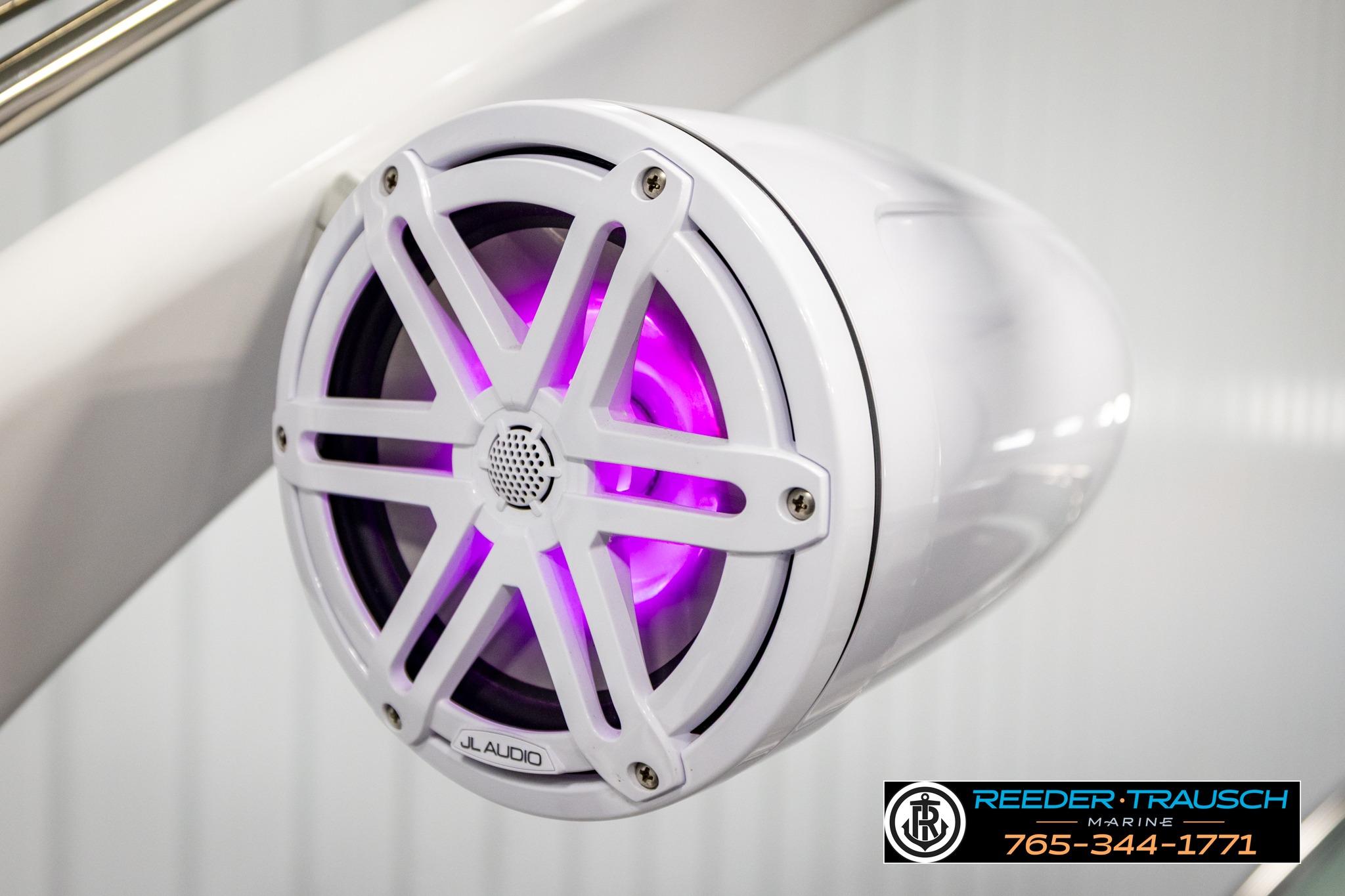 2024 FOURWINNS HD5 Surf boat speaker with purple LED lighting, JL Audio branding.