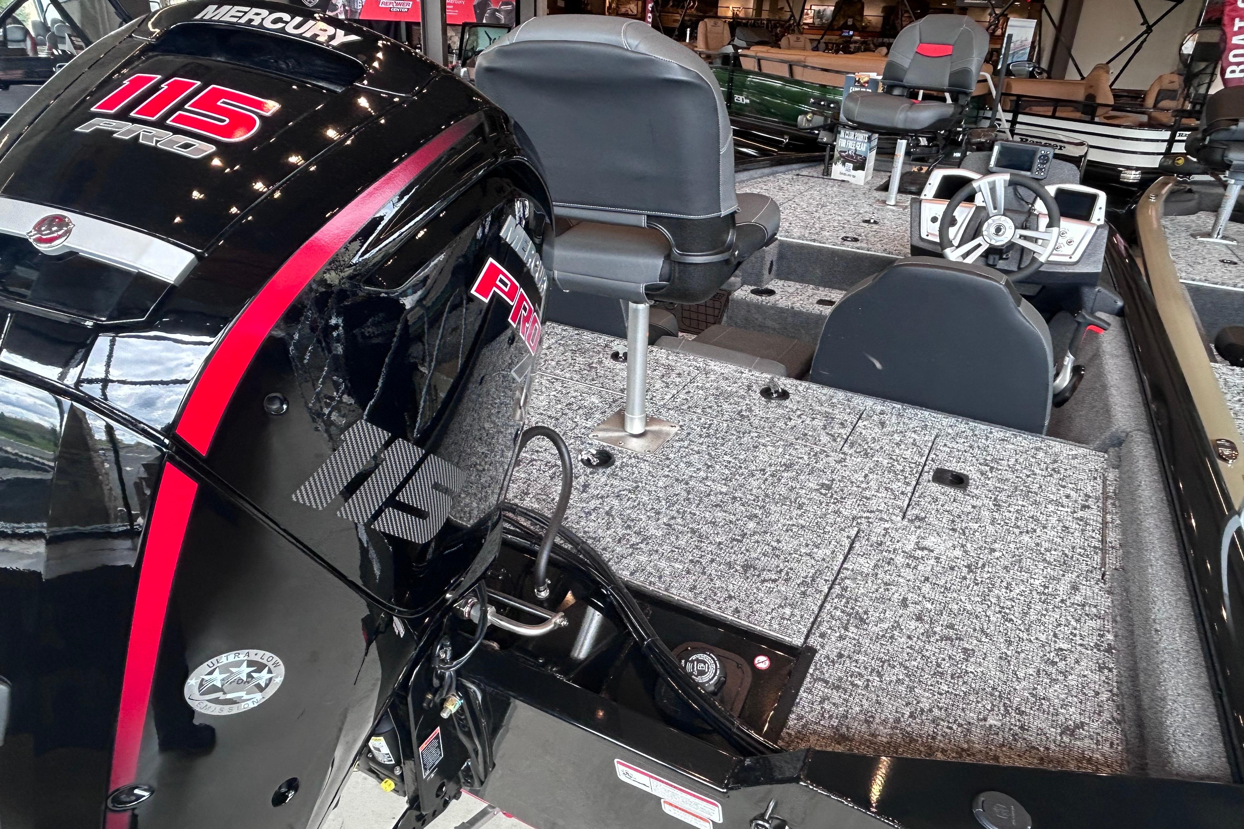 2026 Tracker Pro Team 195 boat with Mercury 115 Pro engine, interior view.