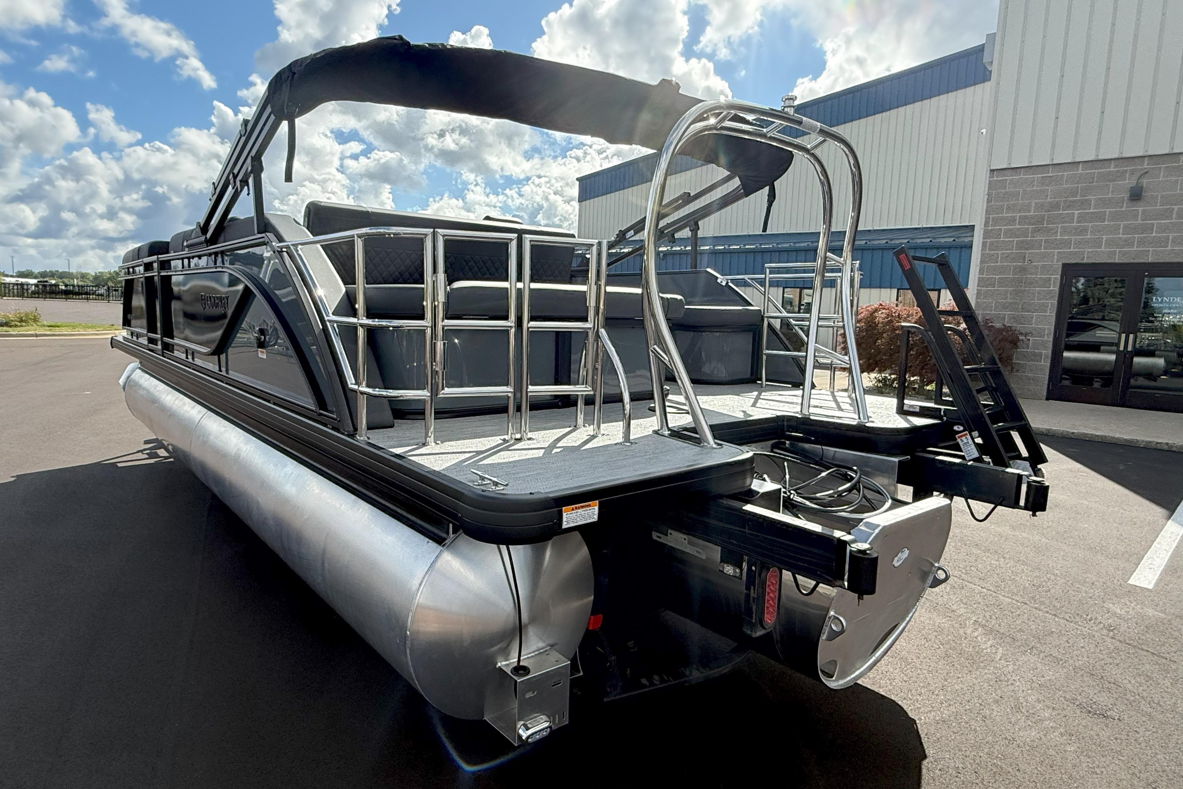 2026 Godfrey SWEETWATER 2286 SFL pontoon boat with sleek design and modern features.