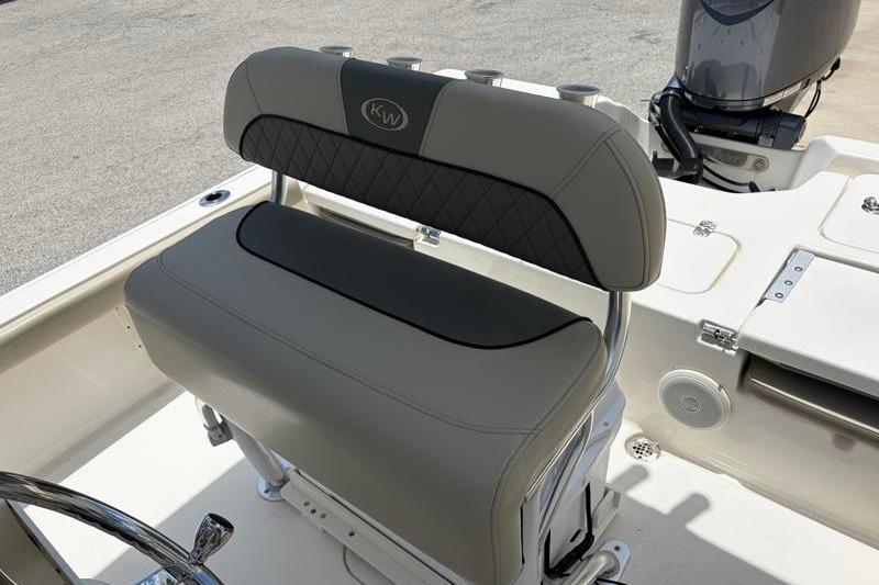 2025 Key West 210 Bay Reef boat seat with gray upholstery and KW logo.