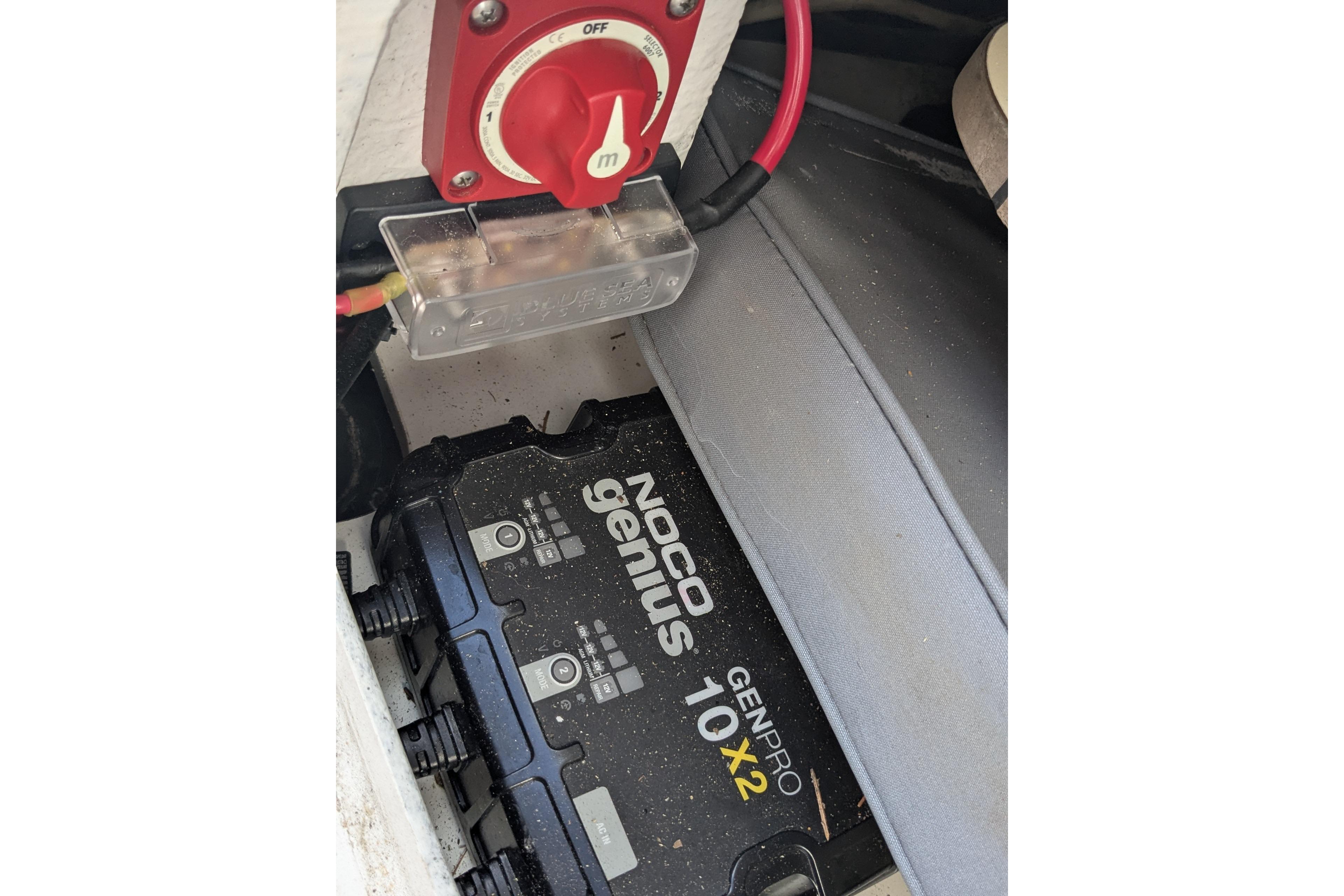 Battery compartment of a 2016 Brig E780 with NOCO Genius GENPRO 10X2 charger.