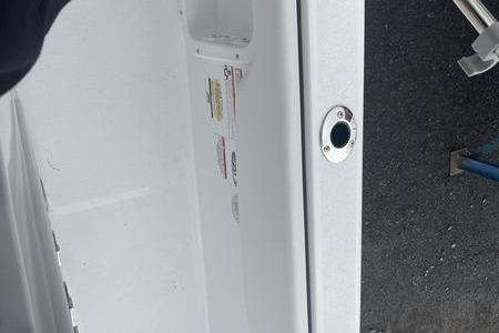 2025 Stingray 173CC boat interior detail with visible labels and fittings.