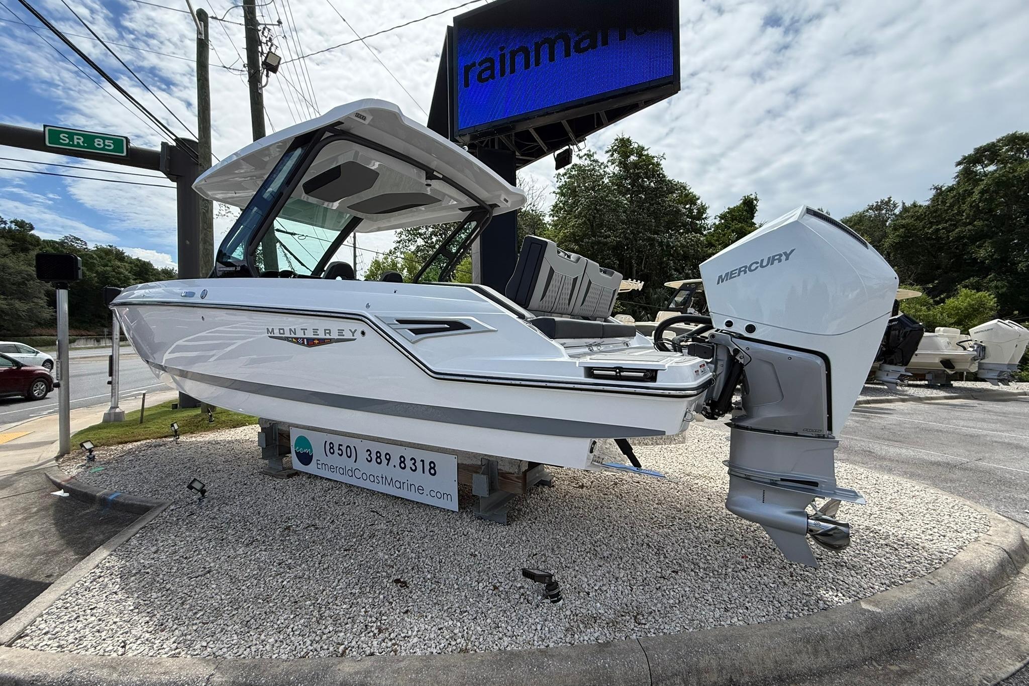 2027 Monterey Elite 30 OB boat with Mercury engine on display at Emerald Coast Marine.