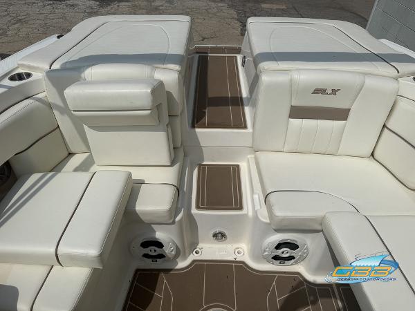 2008 Sea Ray 270 SLX boat interior with white seating and brown accents.