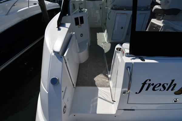2010 Cruisers Yachts 390 Sports Coupe, rear deck view with open door.
