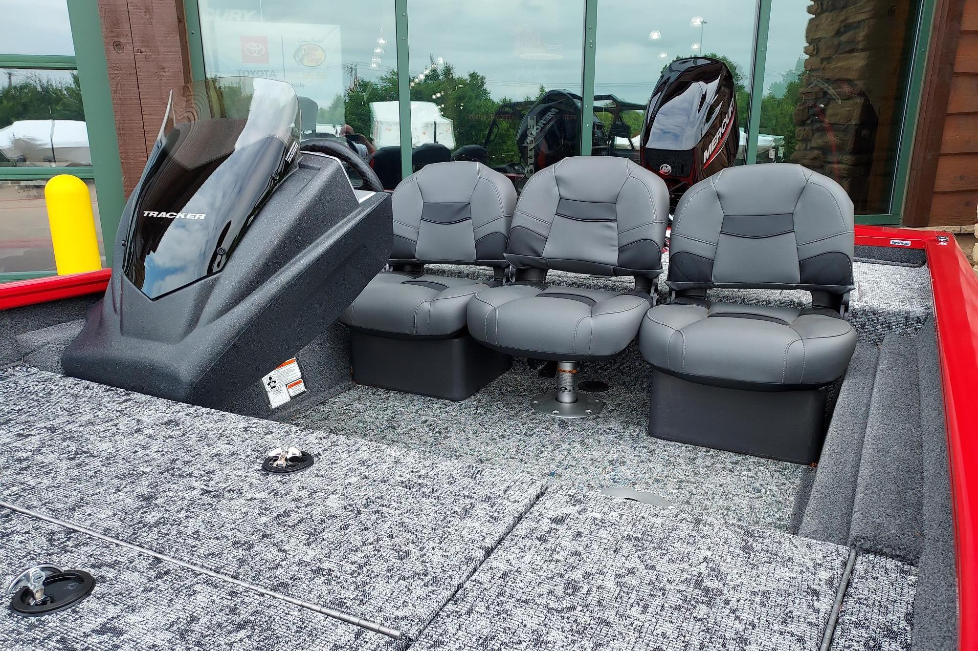 2026 Tracker Pro Team 175 Crappie Edition boat with three gray seats and sleek design.