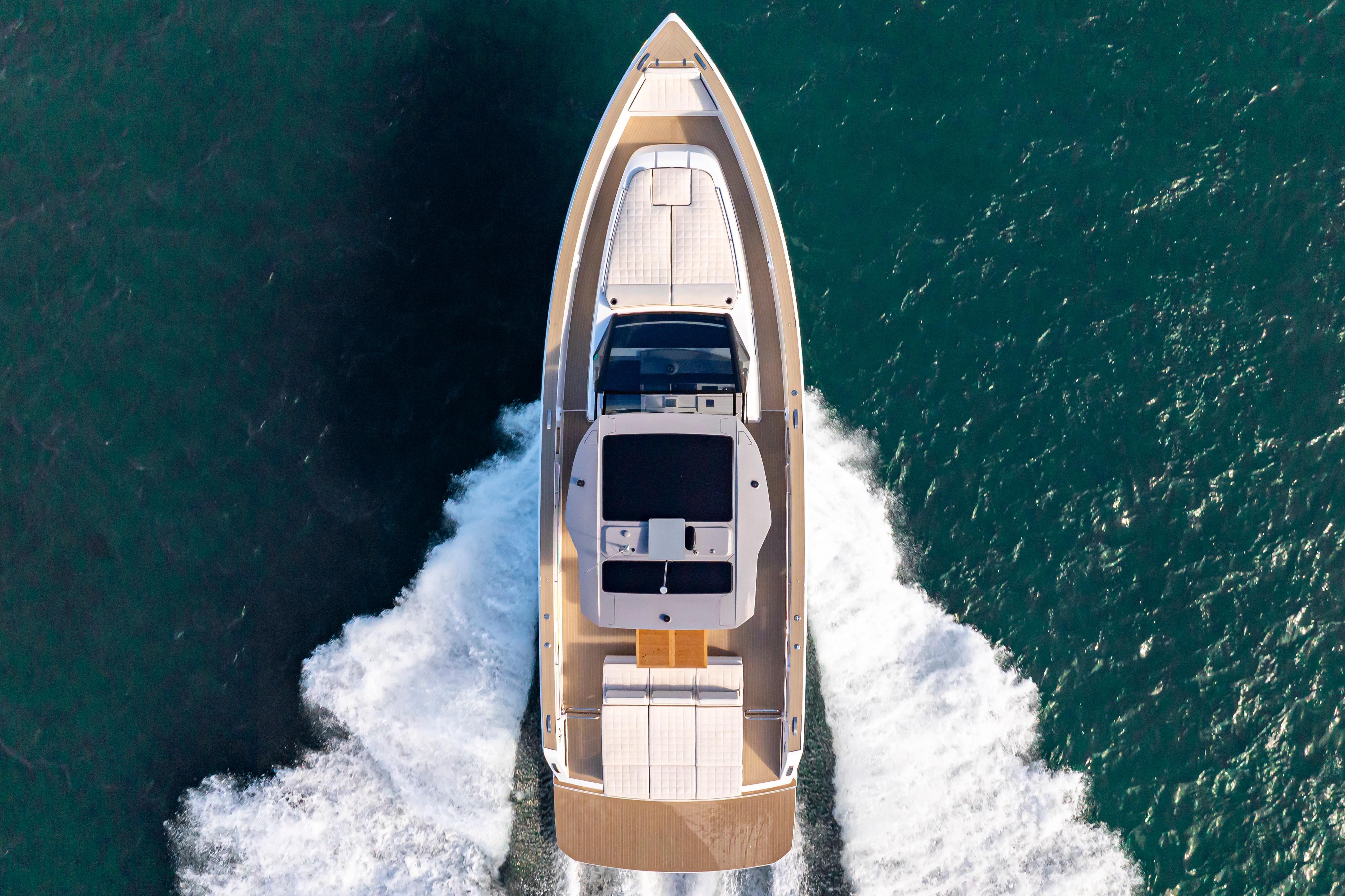 2024 Pardo Yachts P43 cruising on open water, aerial view.