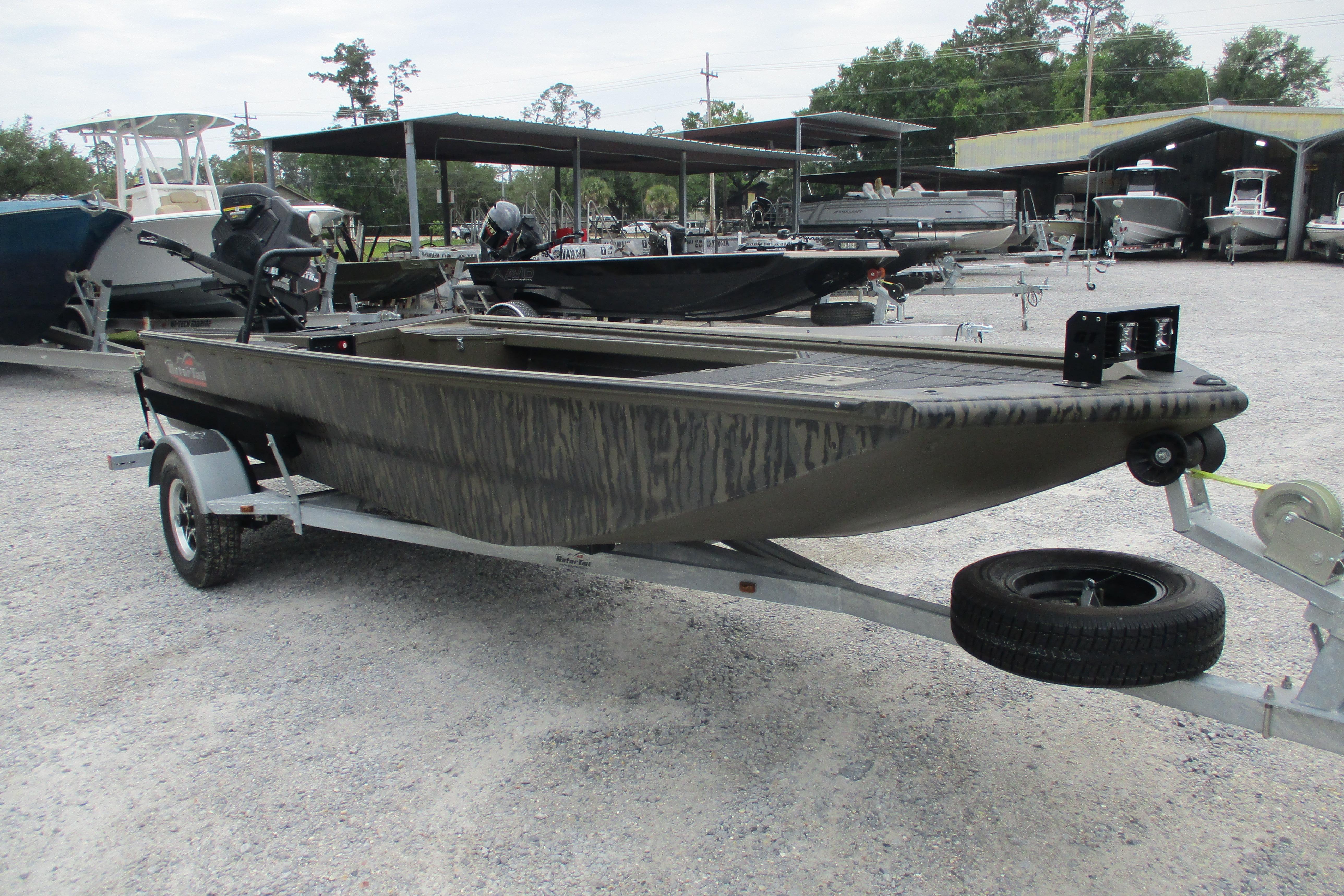 2026 Gator Tail 1854 Extreme boat on trailer in outdoor dealership lot.