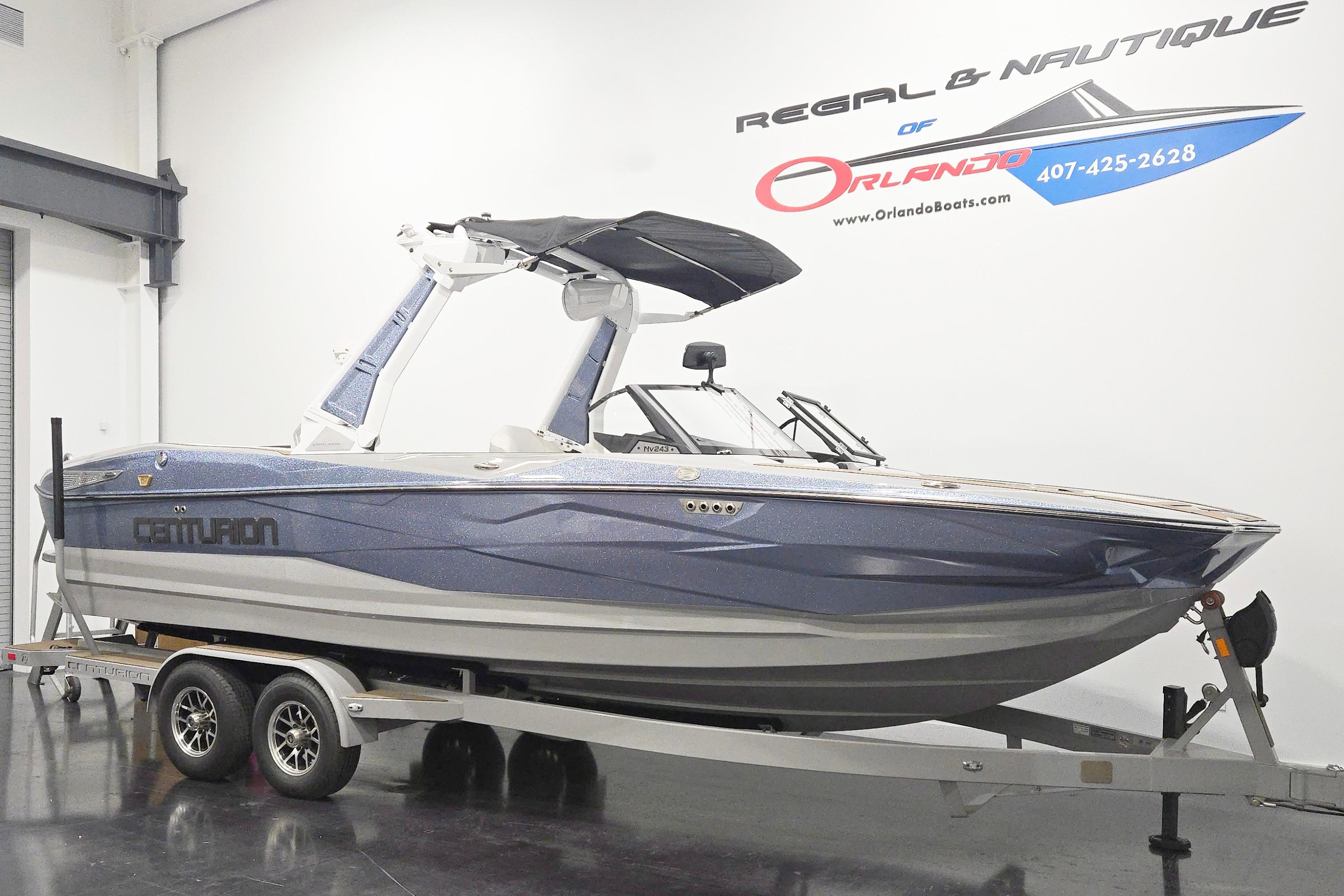 2026 Centurion Nv243 boat on trailer in showroom, Orlando dealership.