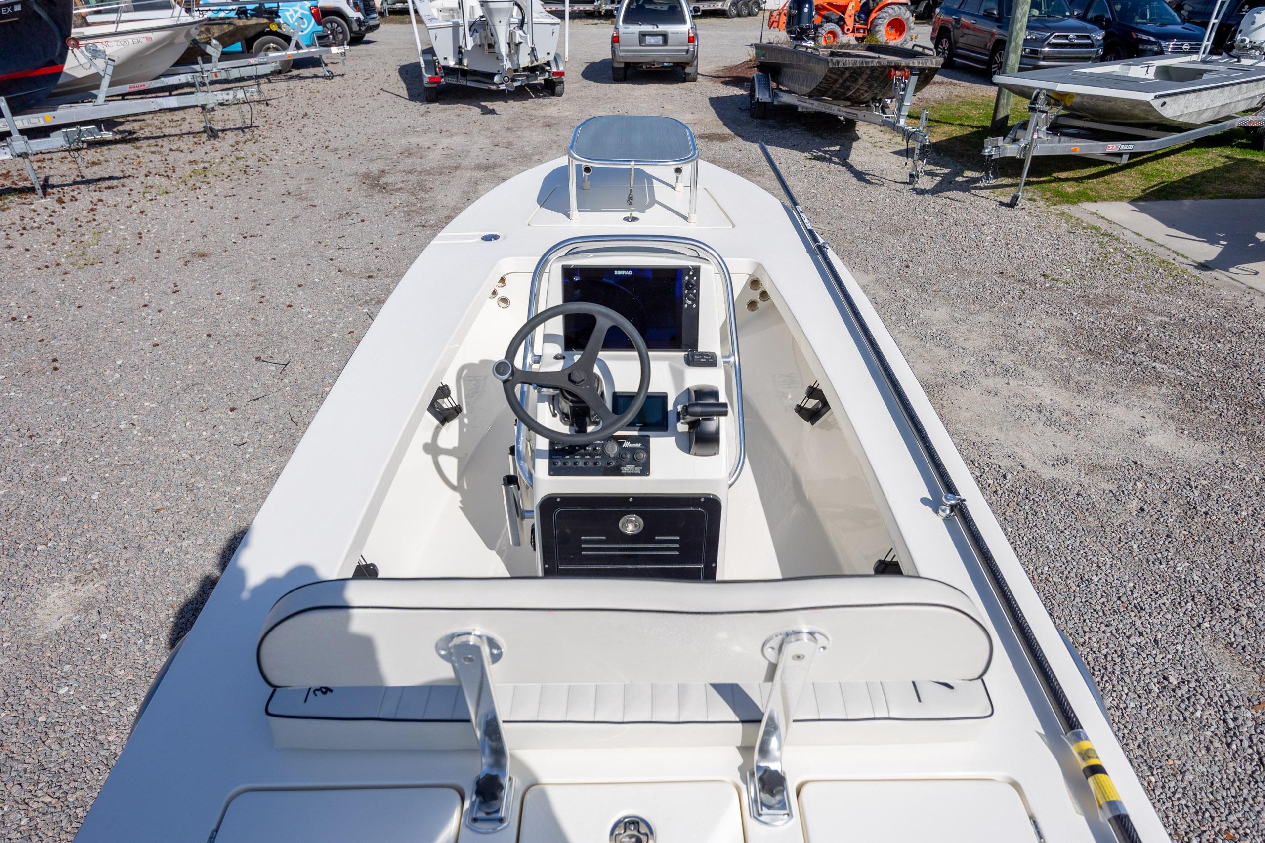 2024 Maverick 17 HPX-S boat interior with steering wheel and control panel.