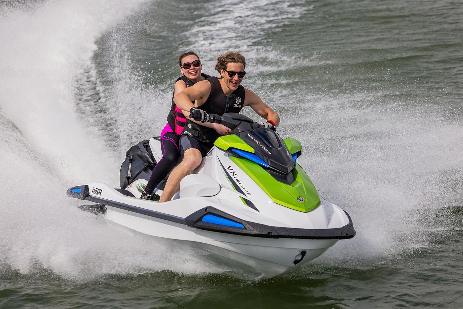 Manufacturer Provided Image: Two people enjoying a ride on a 2026 Yamaha WaveRunner VX Deluxe jet ski.