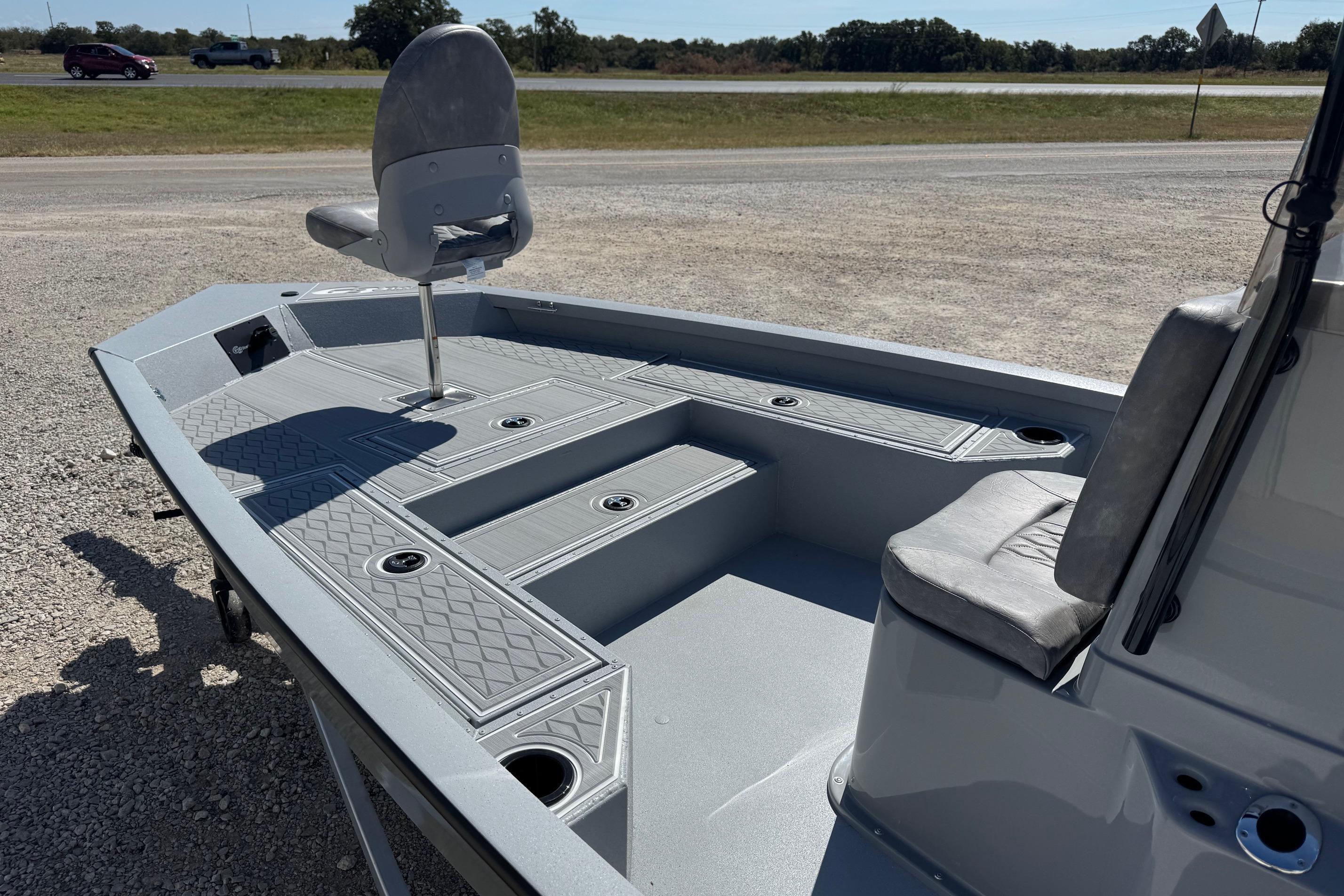 2026 G3 21GX boat interior with seating and storage compartments.