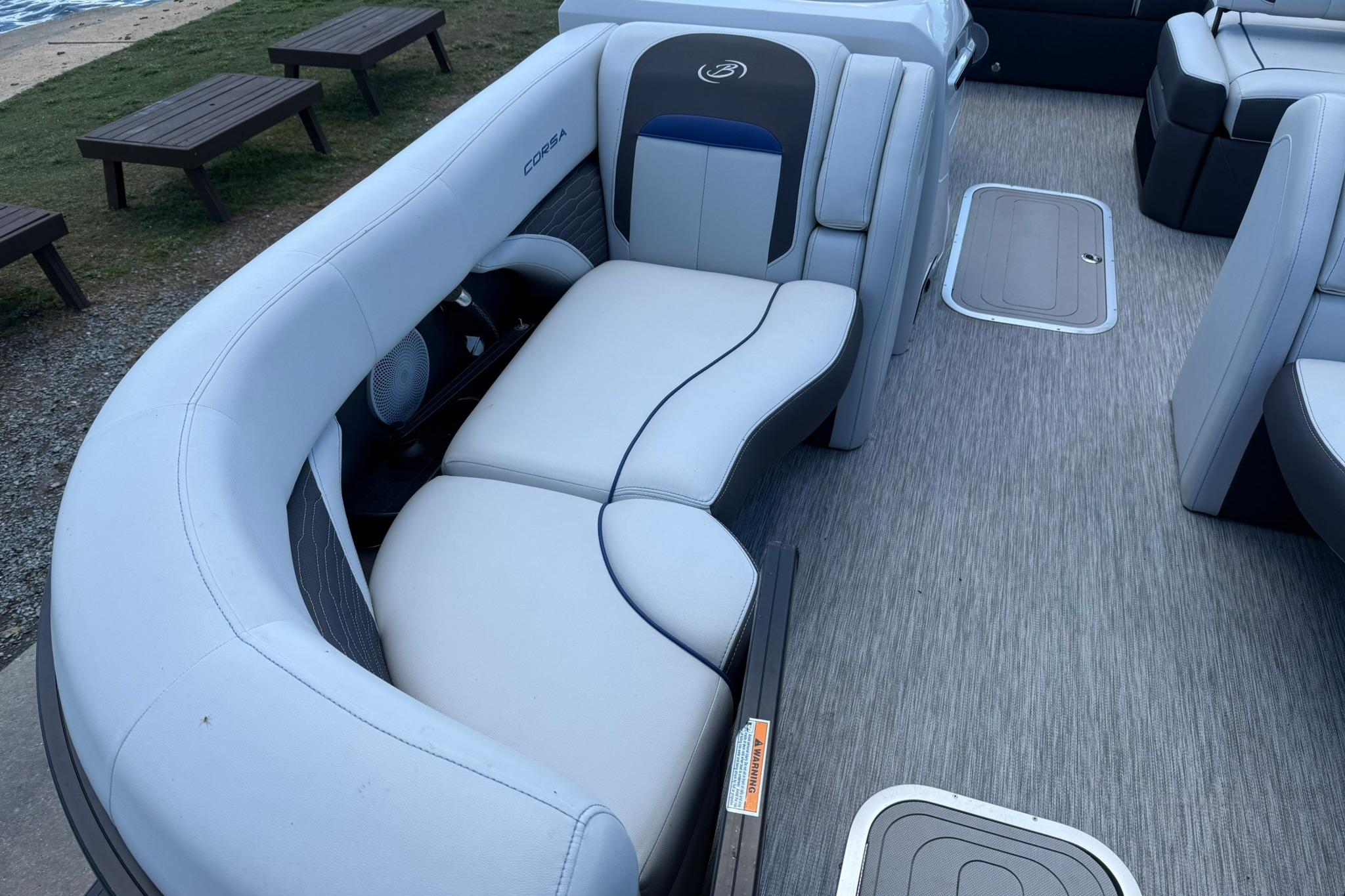 2023 Barletta Corsa 23U pontoon boat interior with plush seating and modern design.