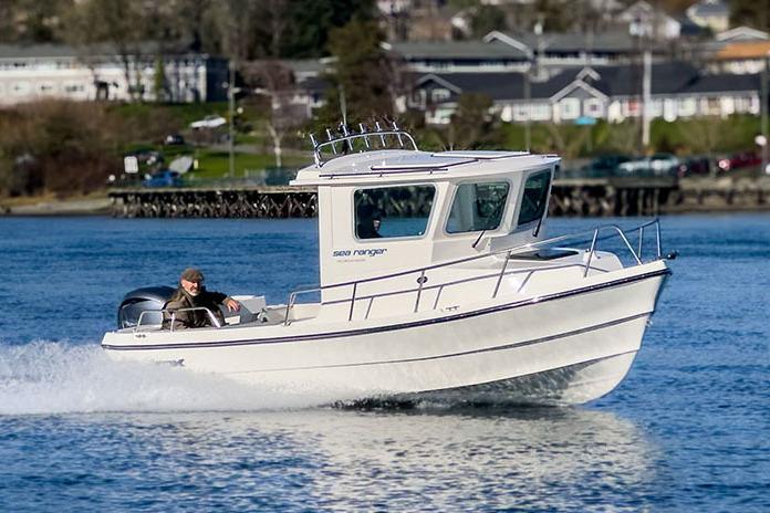 Manufacturer Provided Image: 2026 Arima Sea Ranger 21 Yellowtail Edition cruising on a calm waterway.