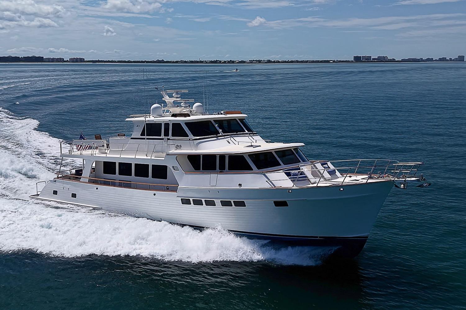Luxury 2014 Marlow 80 Explorer yacht cruising on open water.