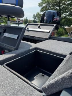 2025 Ranger RT198P boat with storage compartments and motor.