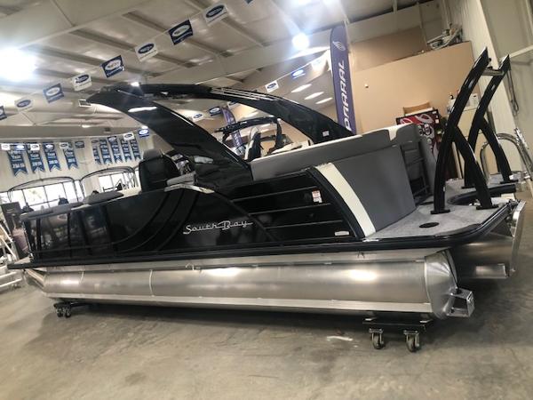 2023 South Bay 525 RS 3.0 Arch pontoon boat in showroom.