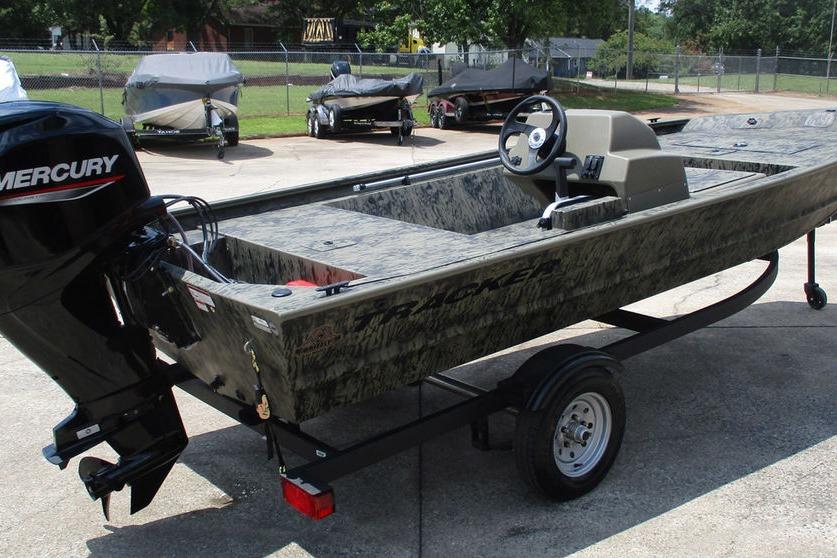 2026 Tracker GRIZZLY® 1648 SC boat with Mercury engine on trailer.
