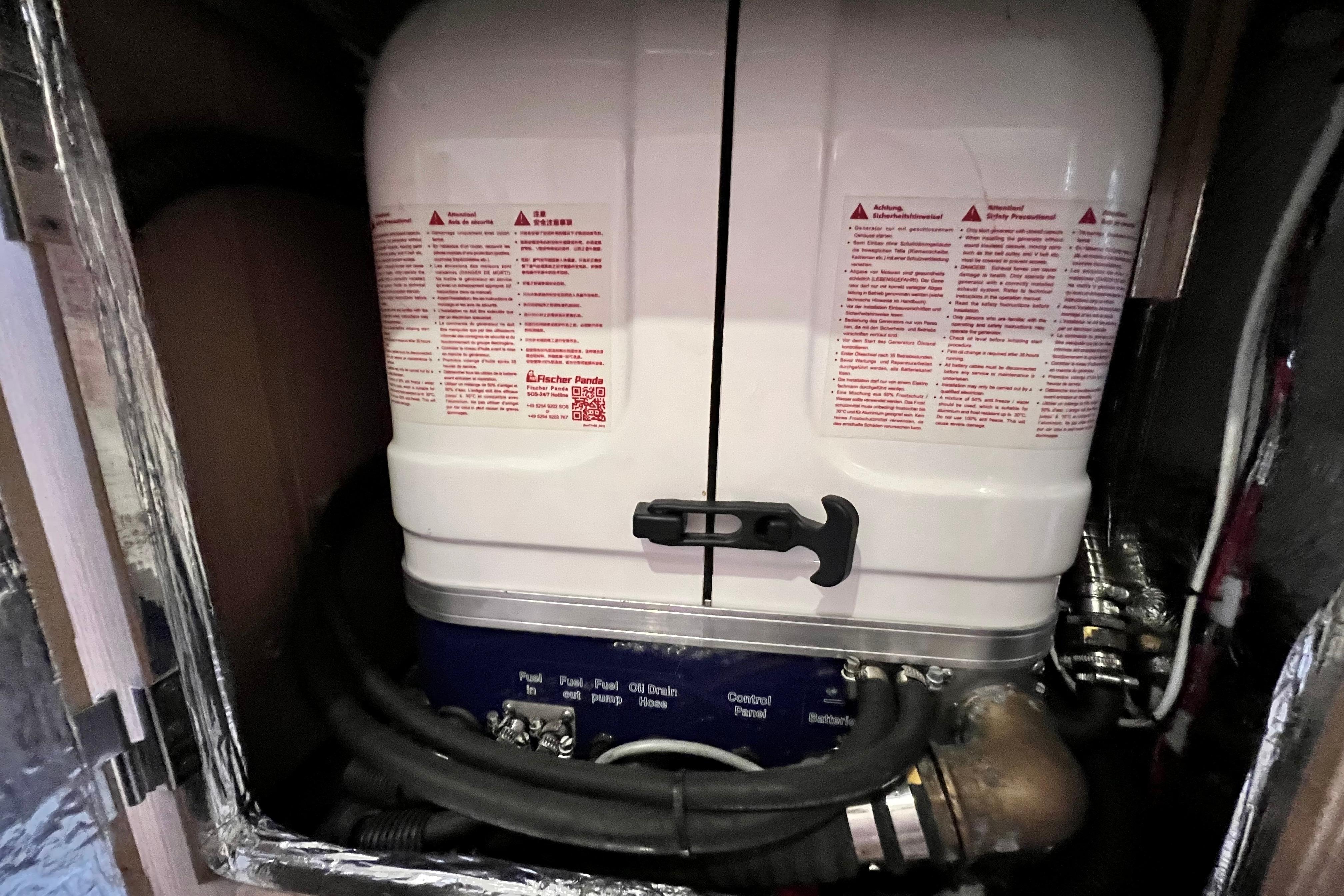 Engine compartment of a 2016 Hanse 455 yacht, featuring a Fischer Panda generator.