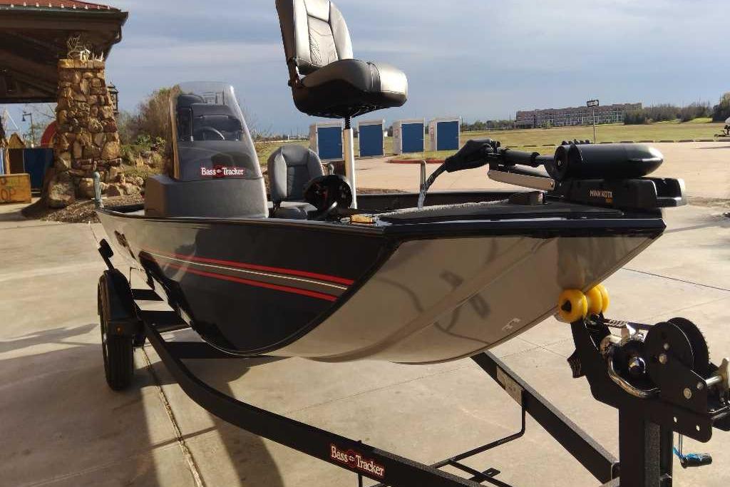 2026 Tracker Bass Tracker Classic XL boat on trailer, parked outdoors.