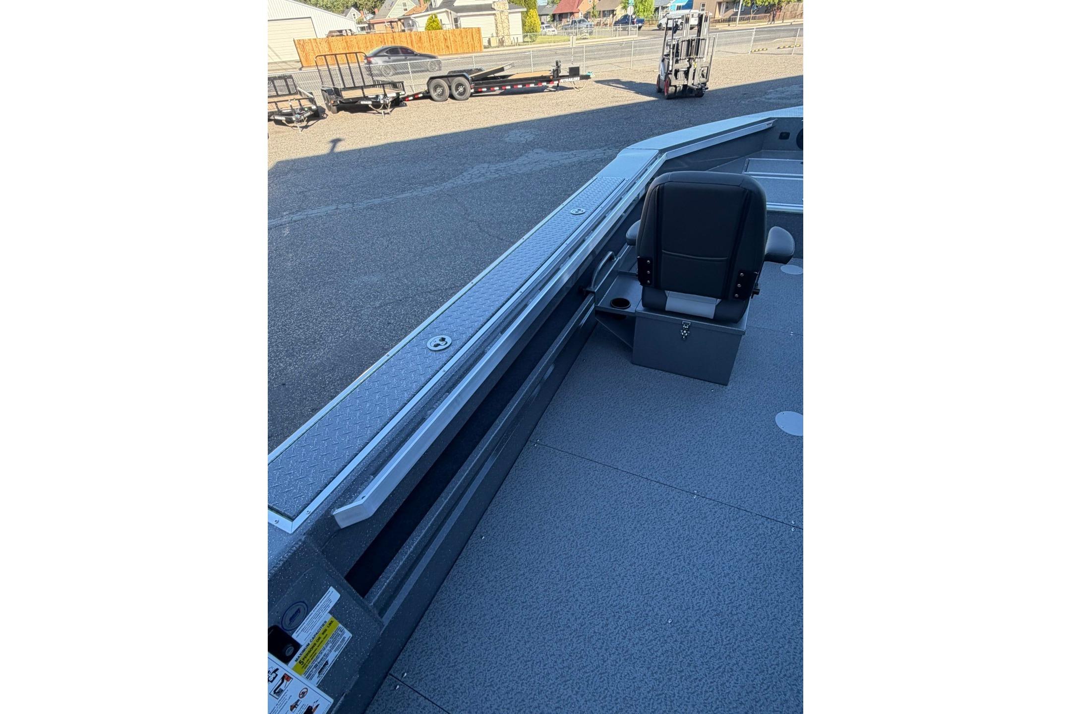 2026 Thunder Jet 209 Rush OT boat interior with seating and storage features.