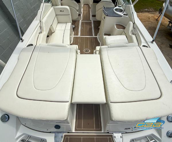 2008 Sea Ray 270 SLX boat interior with white seating and wood accents.