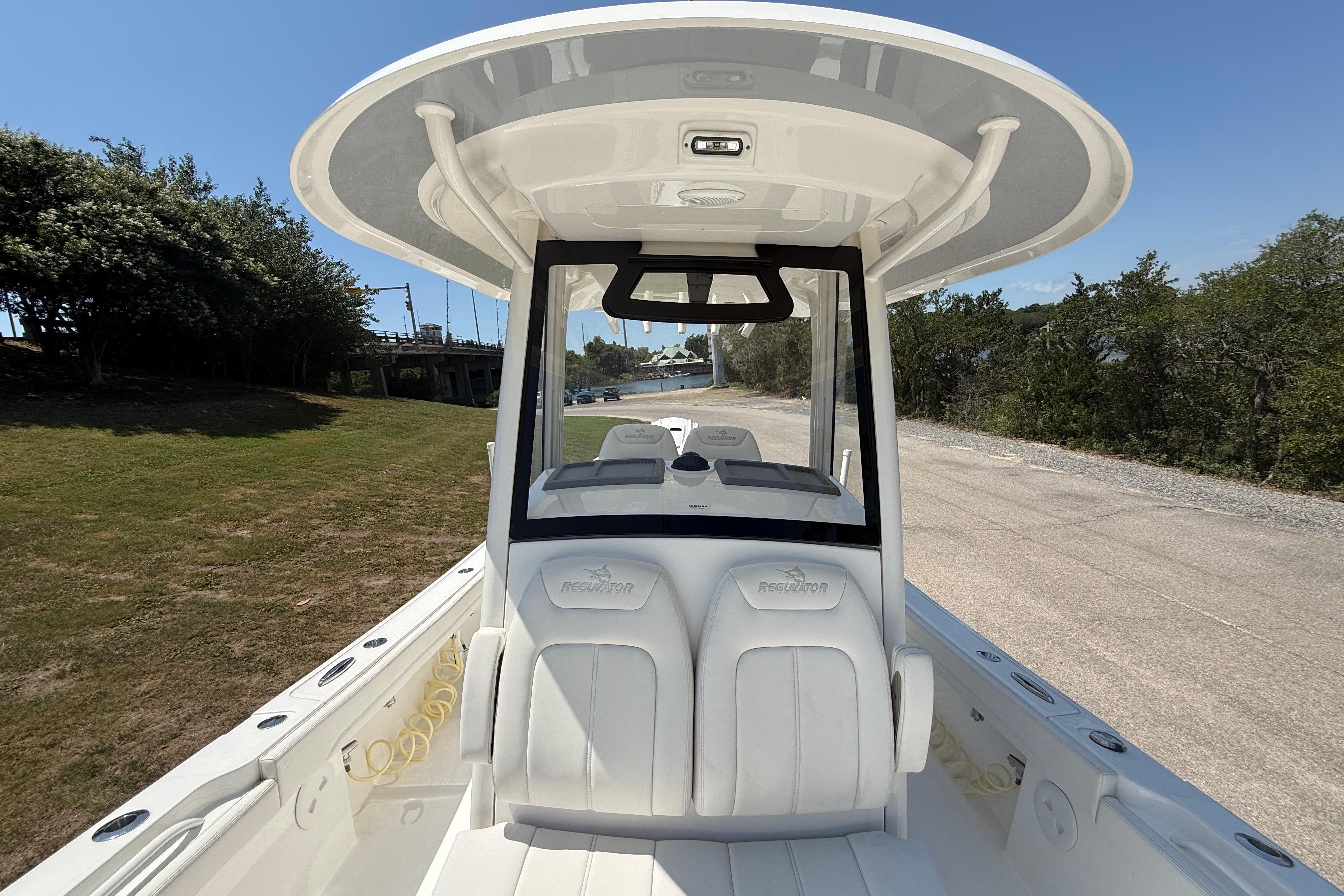 2023 Regulator 26XO boat with sleek design and spacious seating.