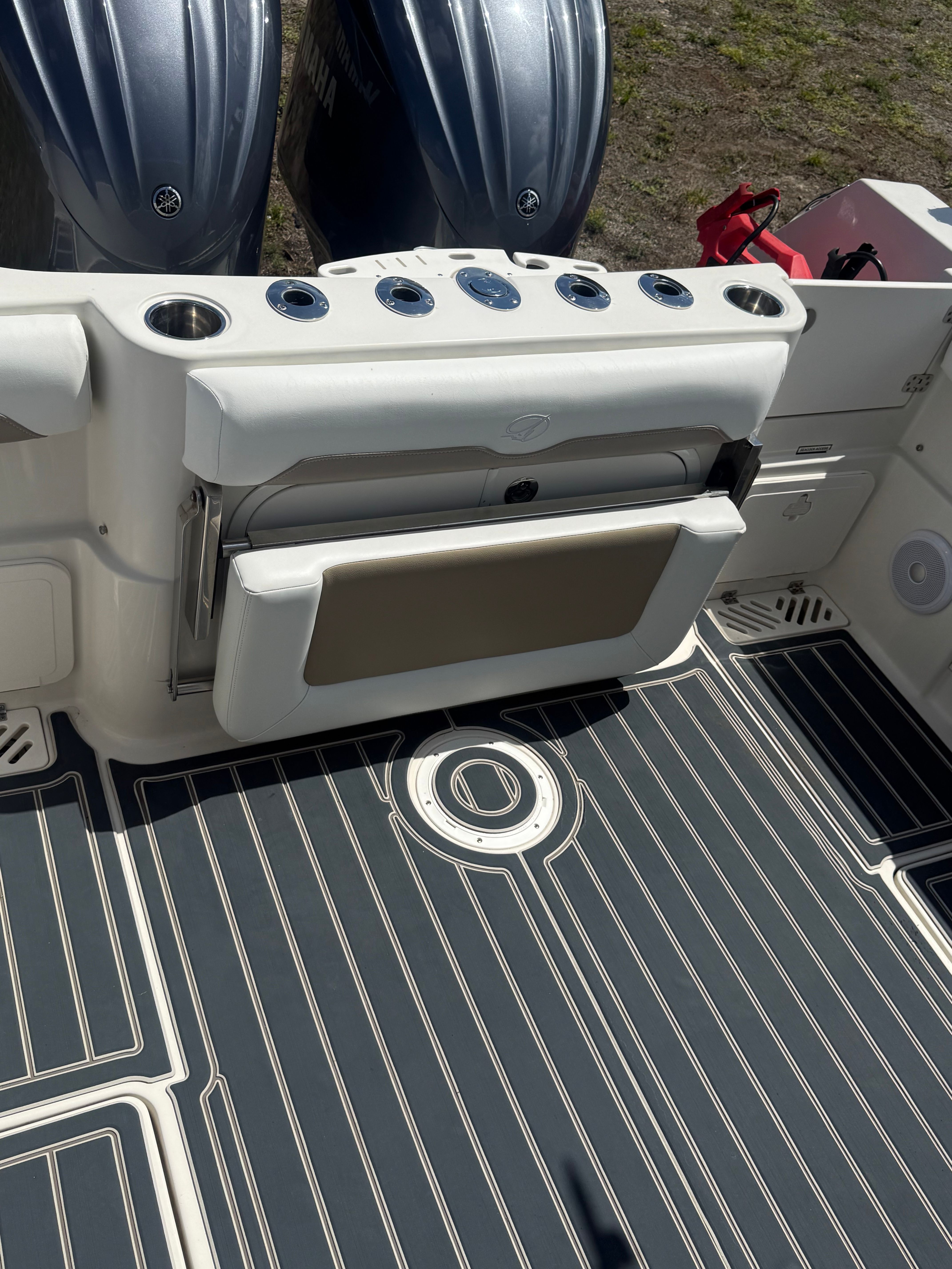 Sailfish 290 CC 2015 boat with Yamaha engines and deck view.