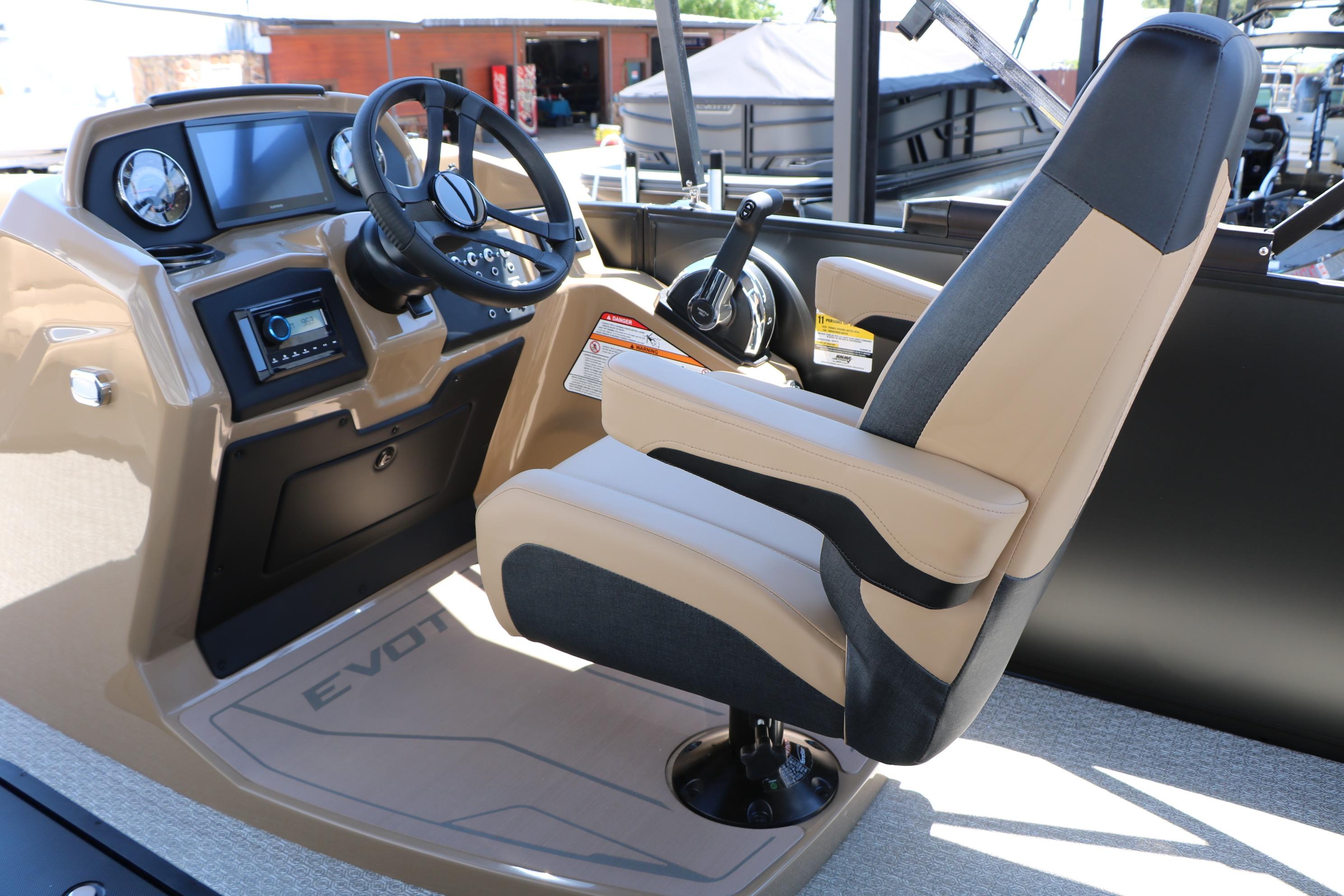 2026 Evotti 521CS boat cockpit with modern steering and comfortable captain's chair.
