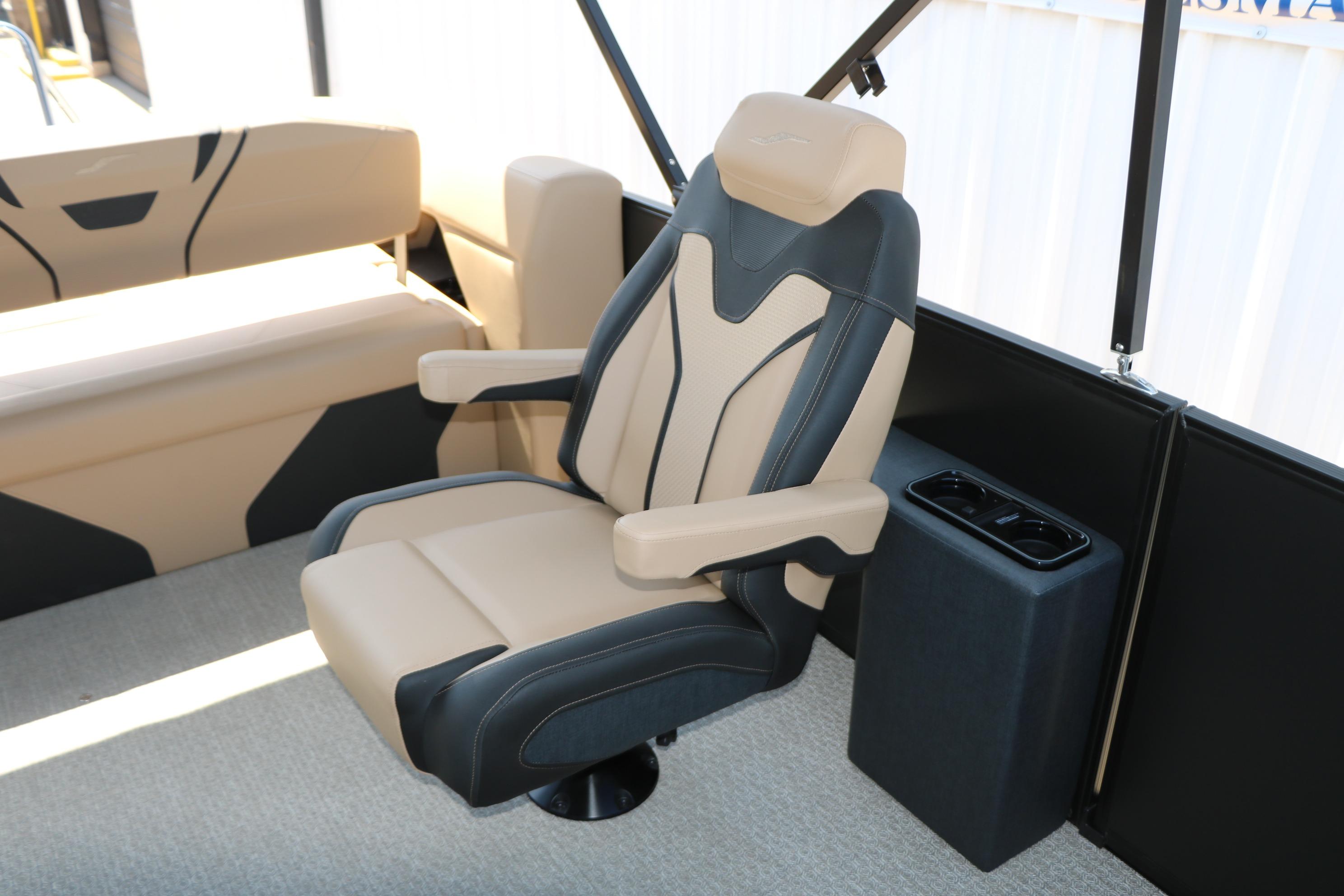 Luxury seating on 2026 Evotti 725 CS Tri-Toon boat with cup holders.