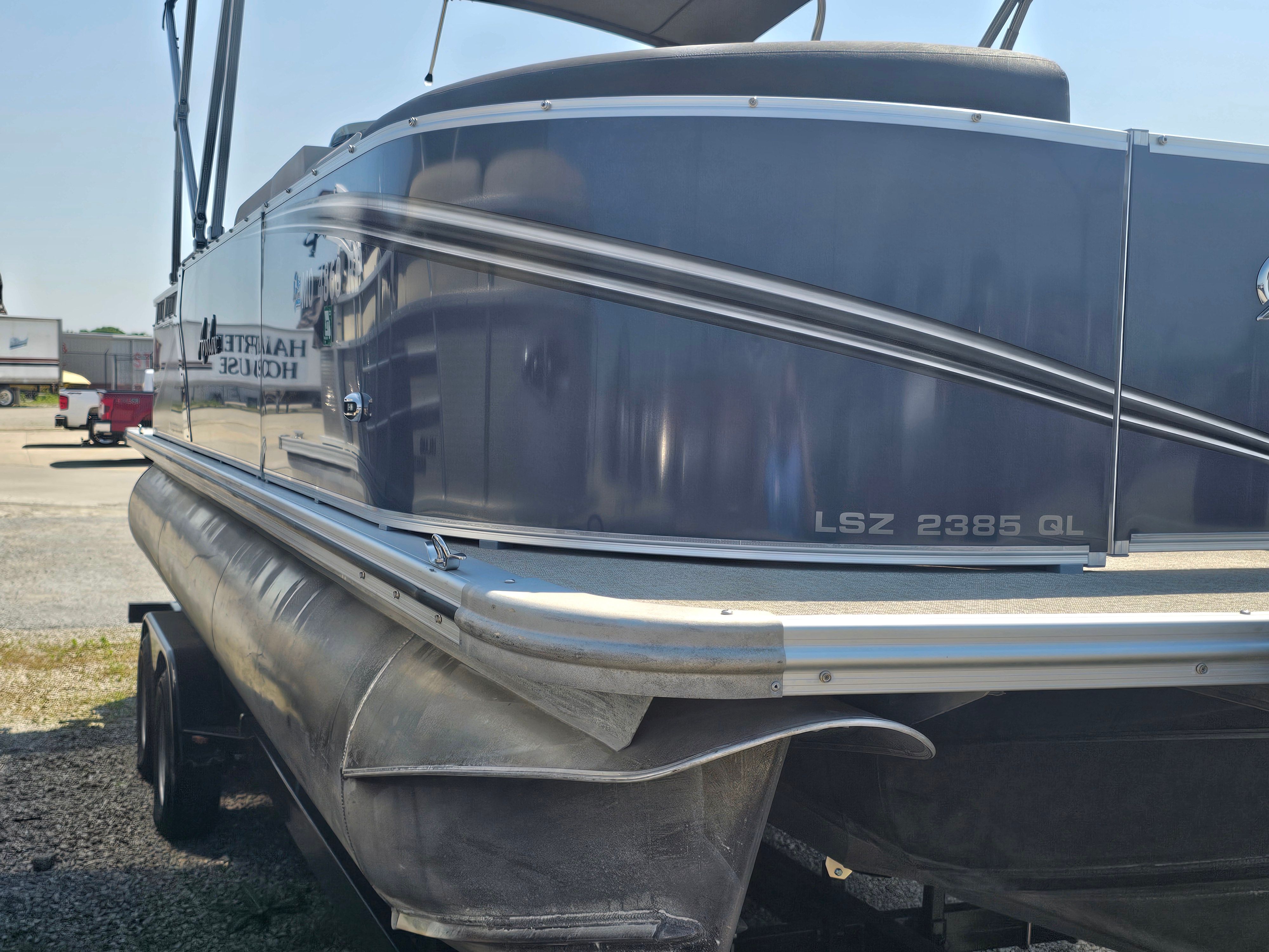 2024 Avalon LSZ 2385 QL pontoon boat side view.
