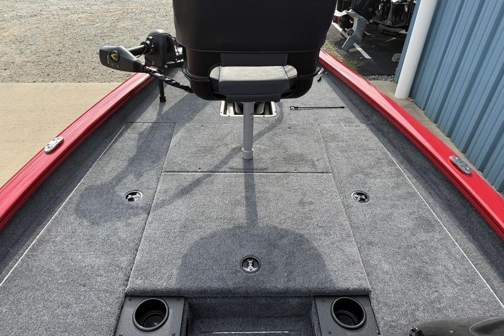 2026 Tracker Pro Team 175 boat deck with gray carpet and red trim.