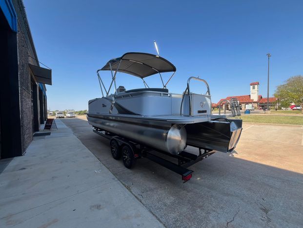 2025 Tahoe LTZ QL pontoon boat on trailer, side view.