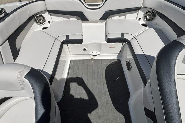 Interior of a 2014 Yamaha Boats 212X, featuring spacious seating and modern design.