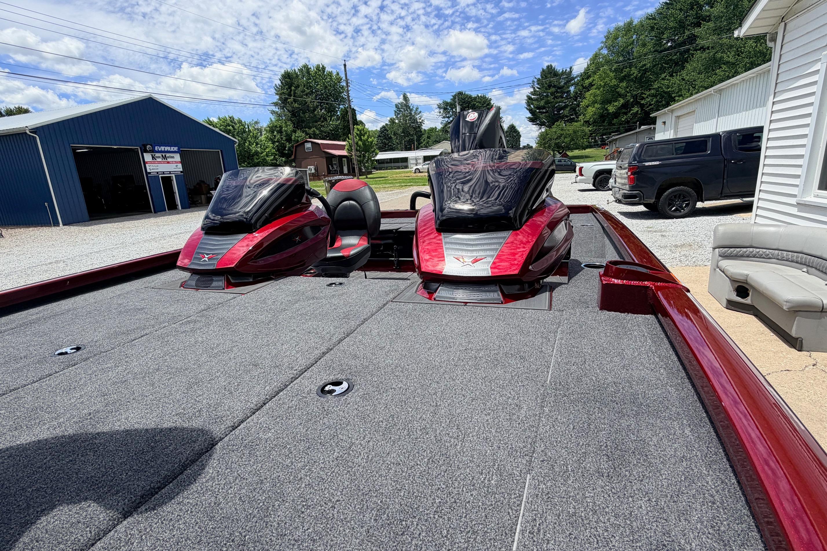 2026 Vexus AVX1985s boat with dual consoles, parked outdoors under a blue sky.