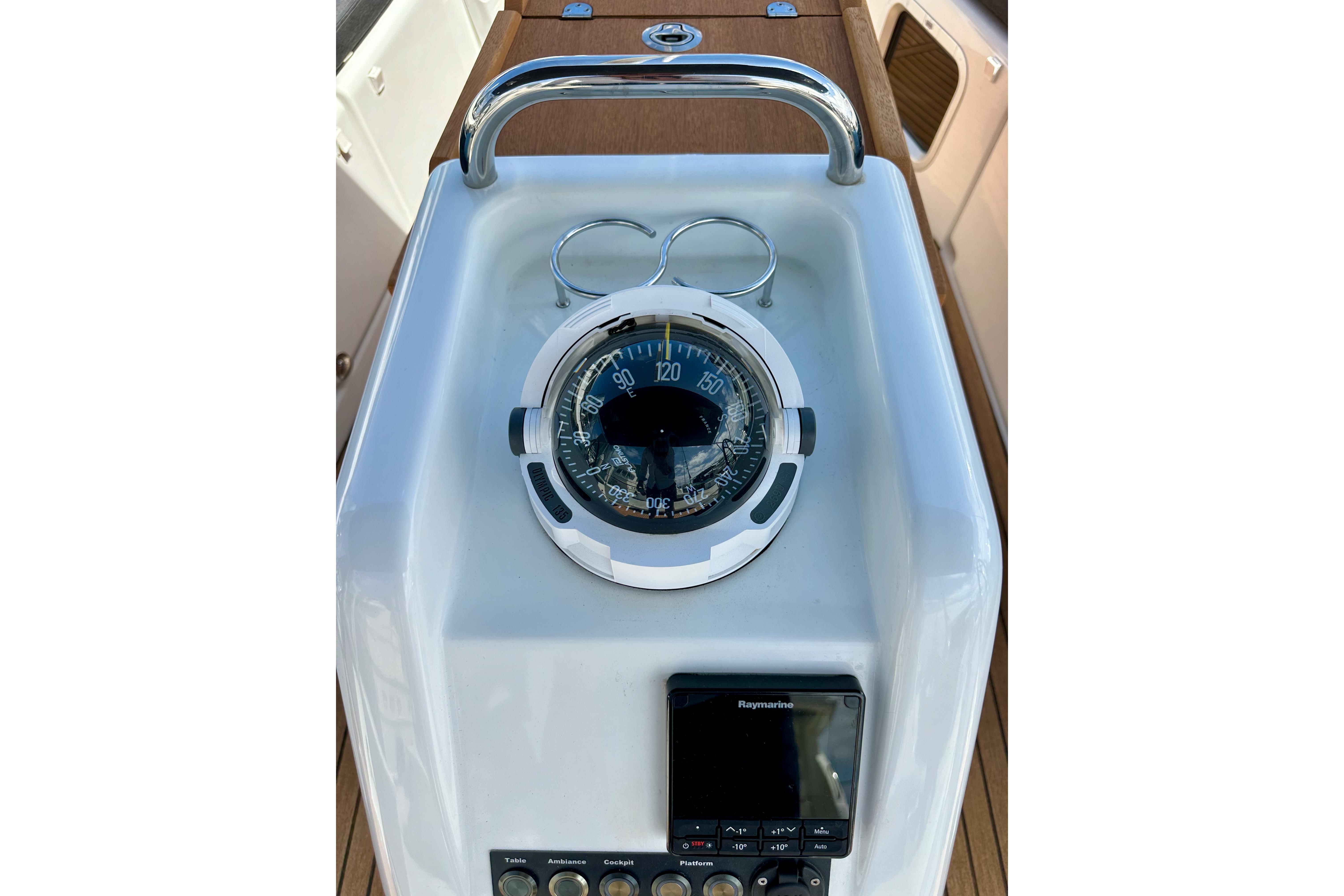 Compass and navigation controls on 2024 Jeanneau Sun Odyssey 410 yacht.