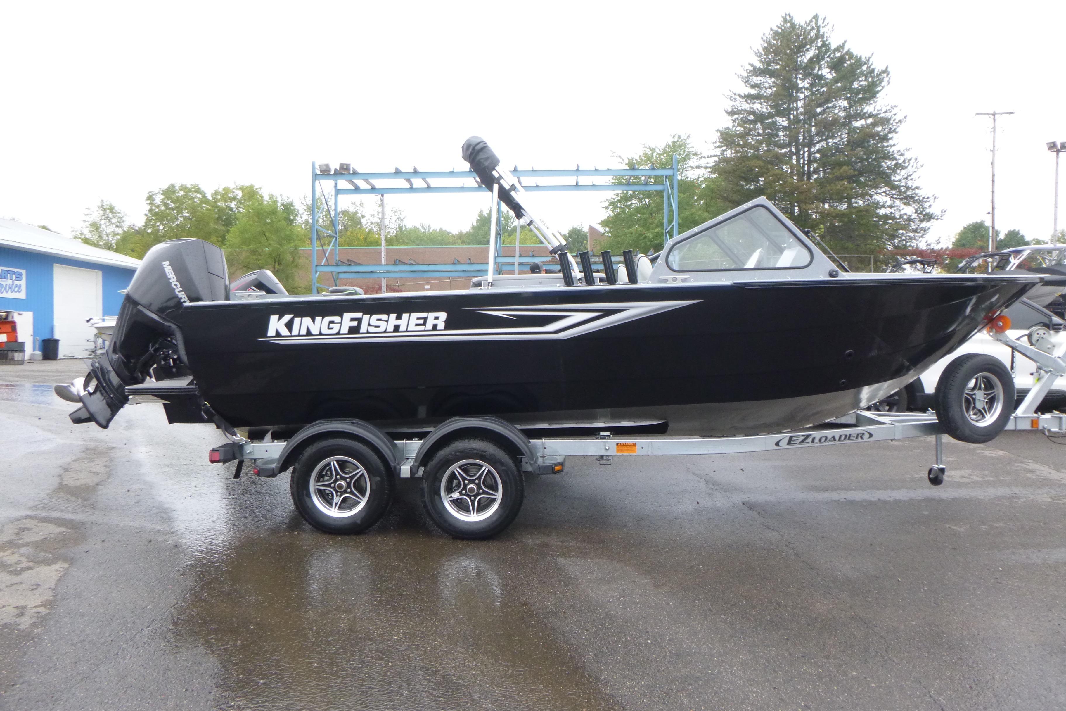 2026 KingFisher 2025 Escape boat on trailer, black exterior, parked outdoors.