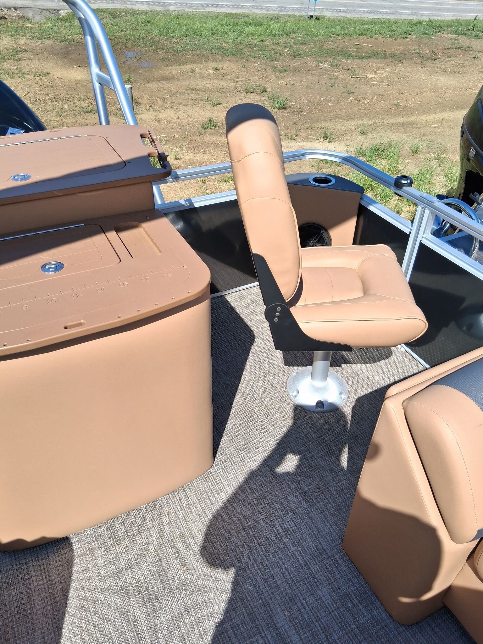 Interior of 2026 Landau Alure 23CC Fish-Charcoal with beige seating.