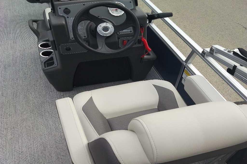 2026 Sun Tracker Bass Buggy 16 XL Select boat interior with steering console and seating.