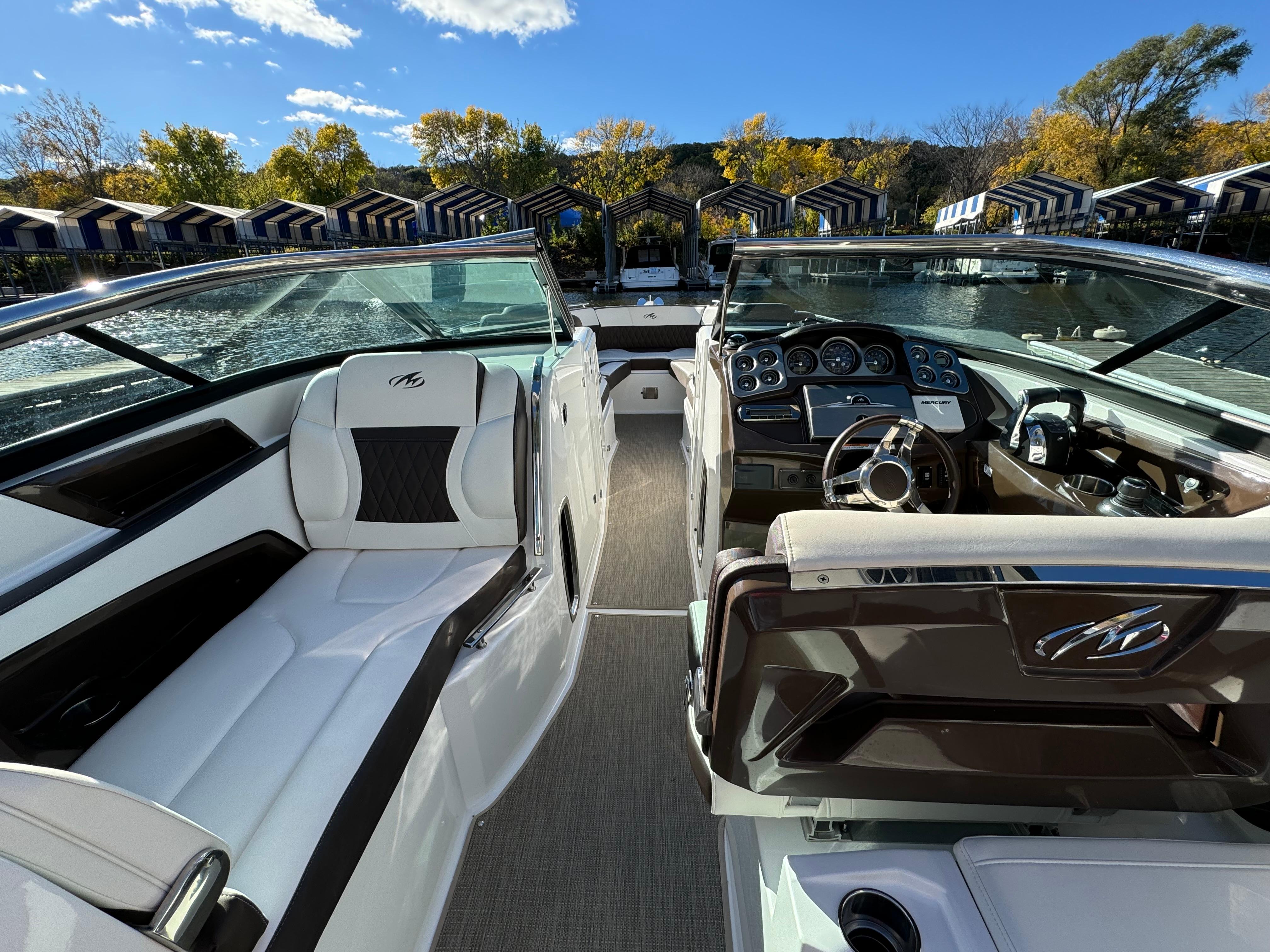 2018 Monterey 328 Super Sport boat interior with luxurious seating and modern dashboard.