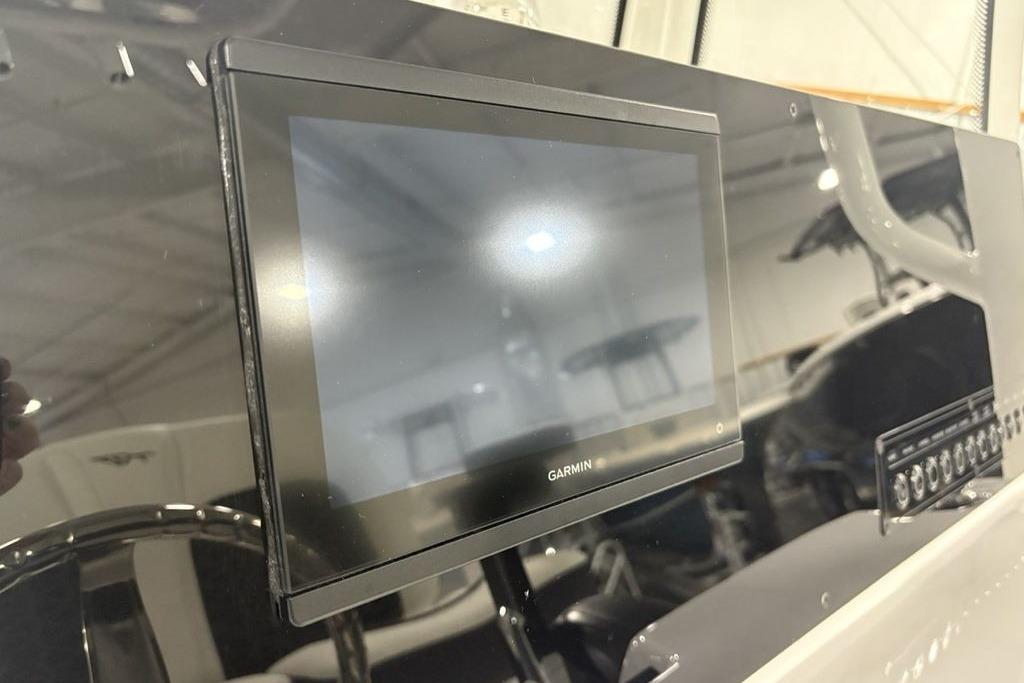 Garmin display on 2026 Tidewater 2210 Carolina Bay boat dashboard.
