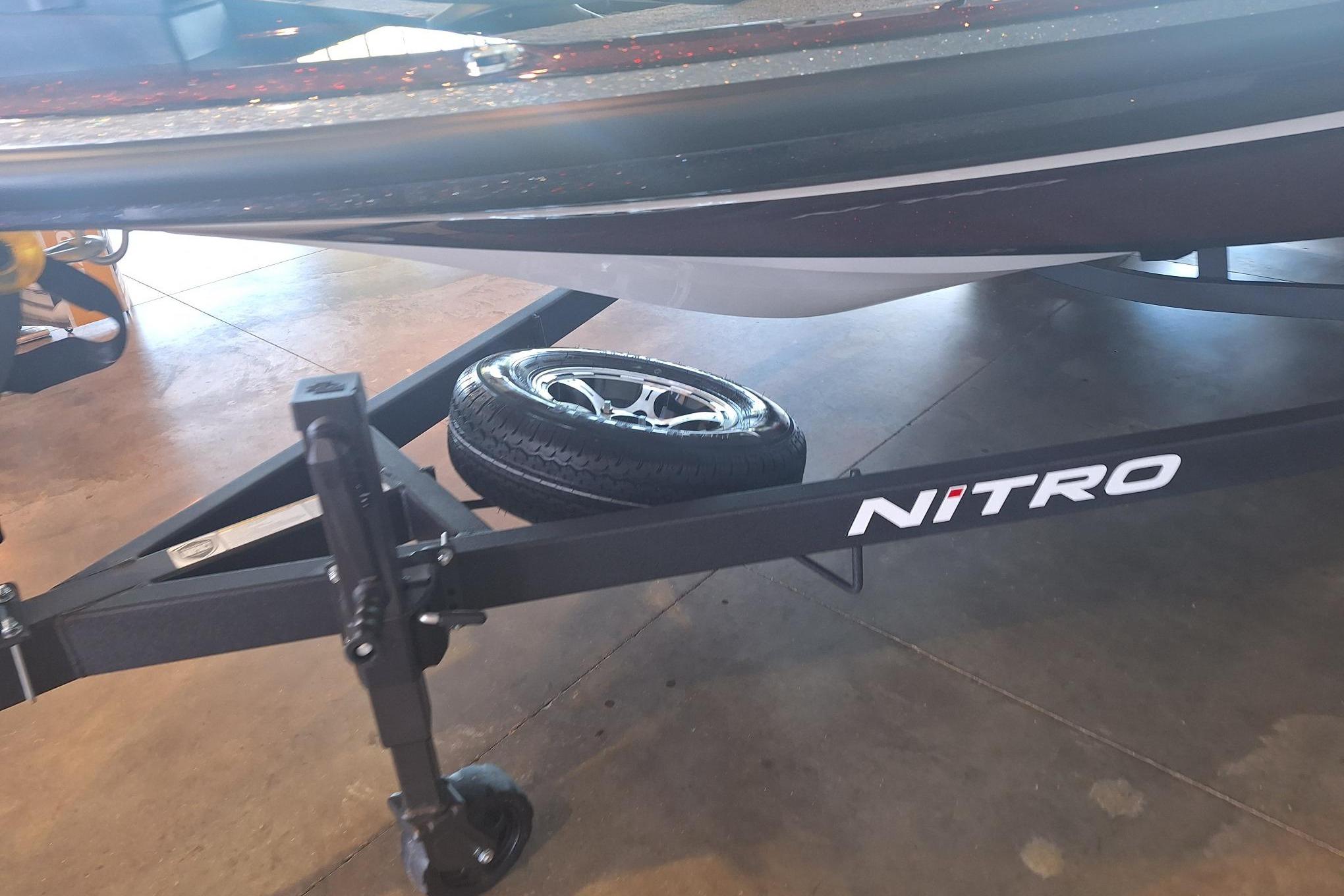 Trailer of a 2026 Nitro Z20 XL boat with spare tire attached.