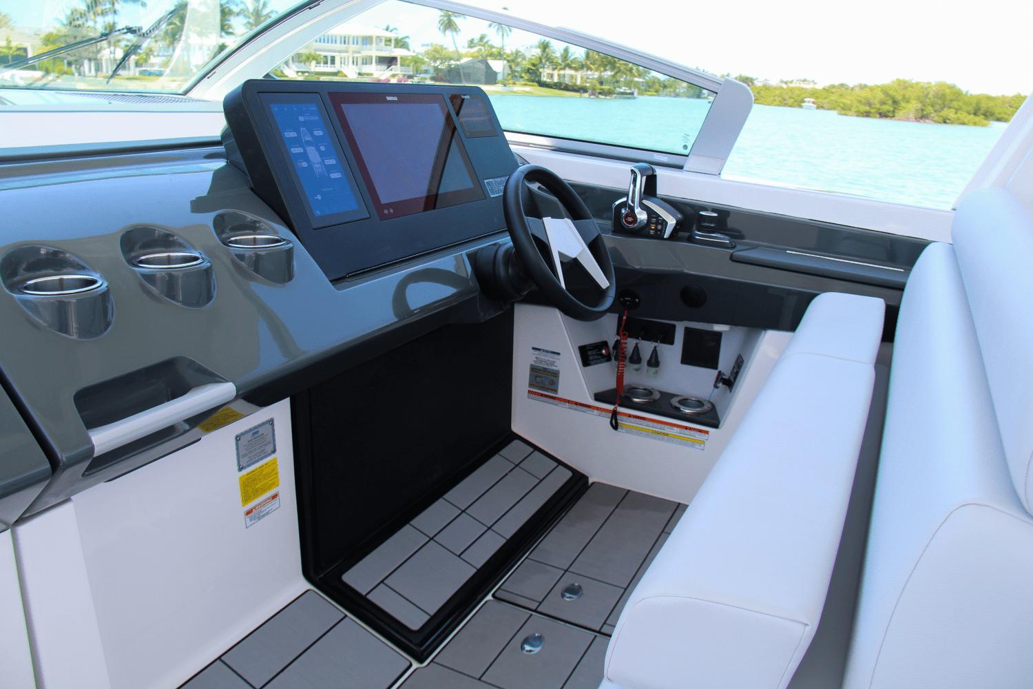 2023 Aviara AV40 OB boat cockpit with modern controls and sleek design.