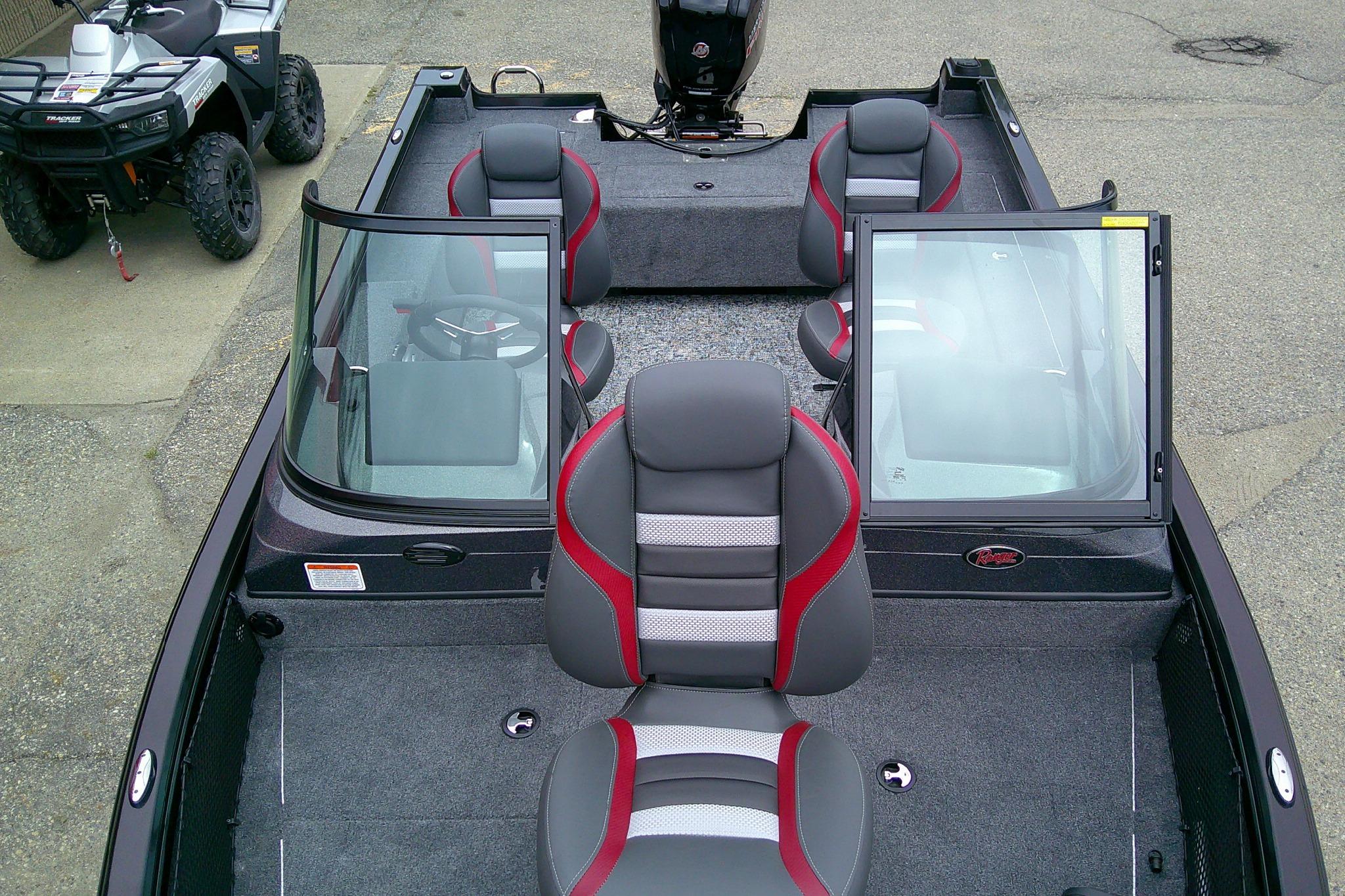 2026 Ranger VS1782SC Reata boat interior with gray and red seating, windshield, and steering wheel.