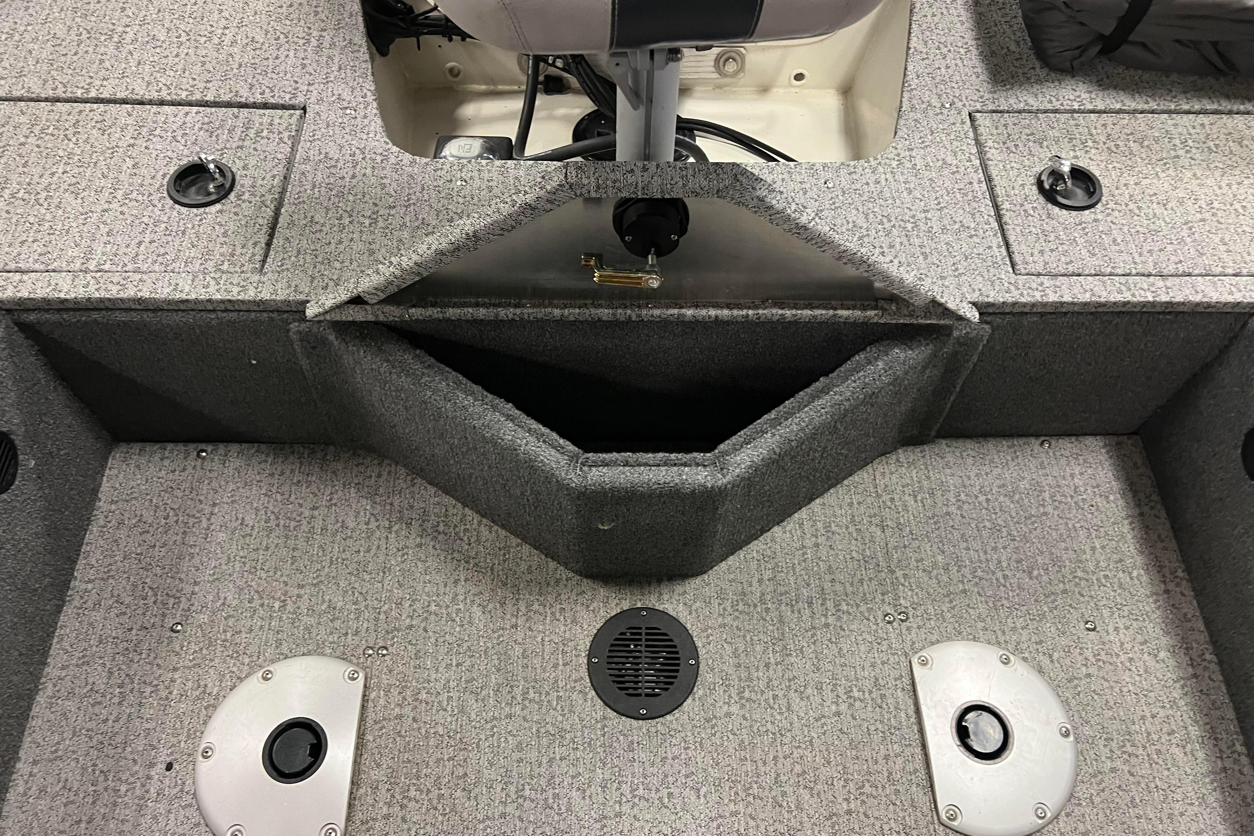 2022 Tracker Pro Guide V-16 WT boat interior with storage compartments and seating.