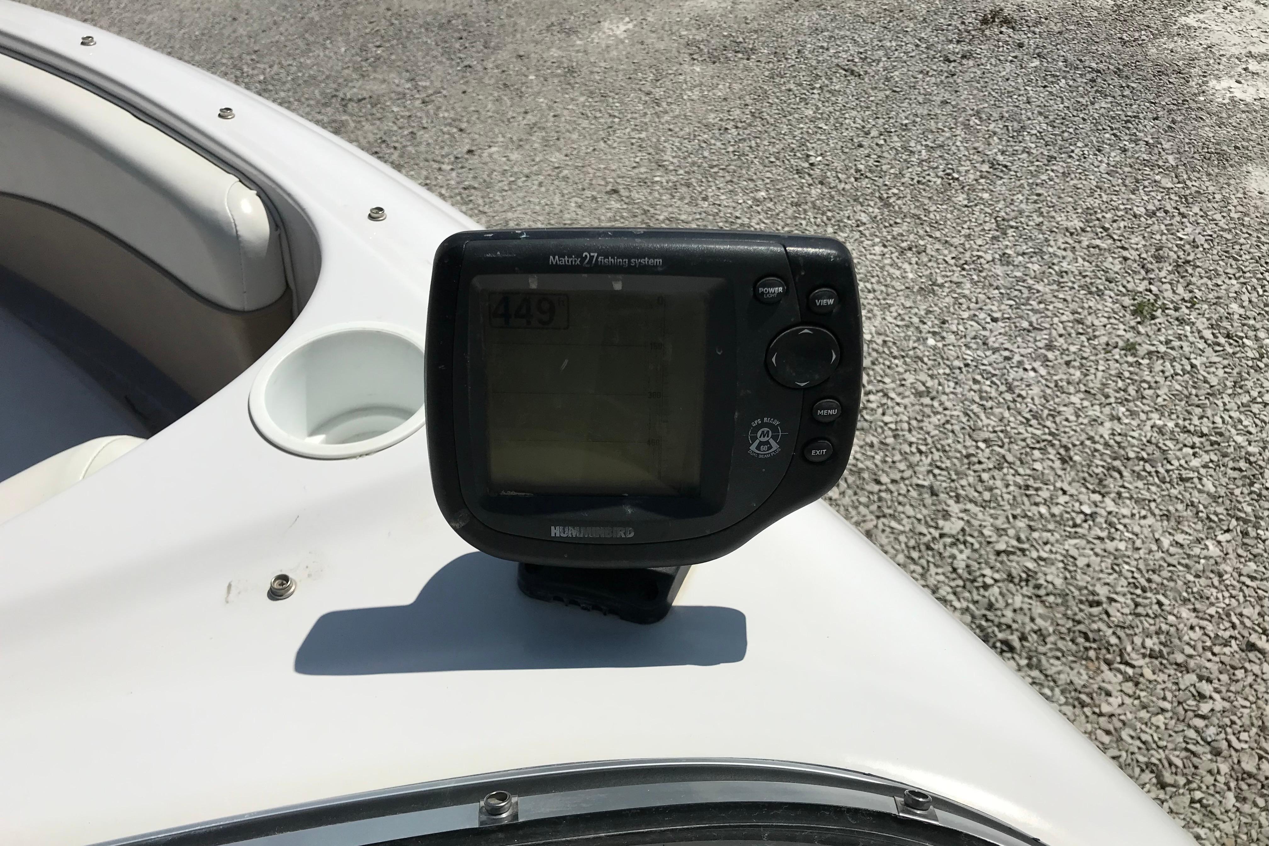 Fishfinder on 2005 Four Winns 180 Horizon FS boat, mounted on white deck.